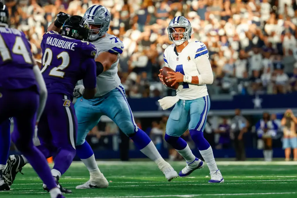 Sep 22, 2024; Arlington, Texas, USA; Dallas Cowboys quarterback Dak Prescott (4) drops back to pass during the fourth quarter against the Baltimore Ravens at AT&T Stadium. Mandatory Credit: Andrew Dieb-Imagn Images