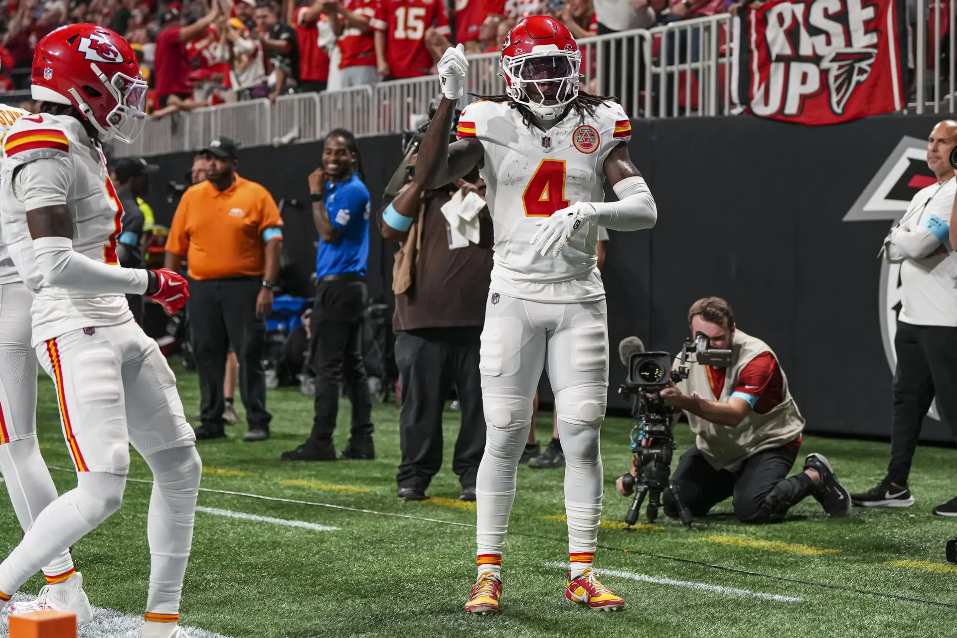 Sep 22, 2024; Atlanta, Georgia, USA; Kansas City Chiefs wide receiver Rashee Rice (4) reacts after scoring a touchdown against the Atlanta Falcons during the first half at Mercedes-Benz Stadium. Mandatory Credit: Dale Zanine-Imagn Images