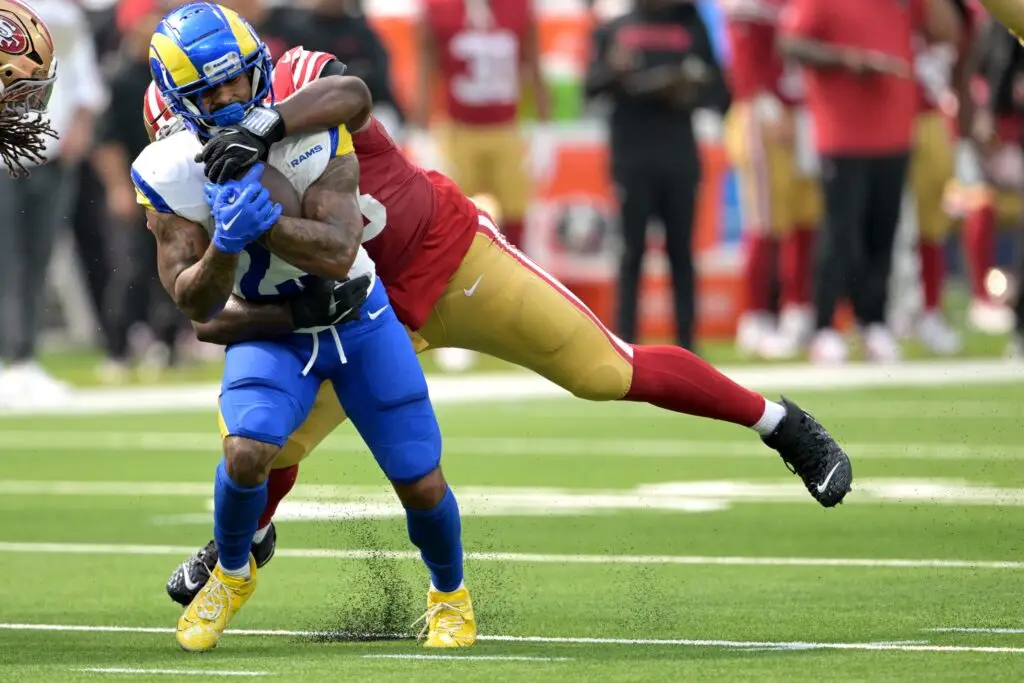 Sep 22, 2024; Inglewood, California, USA; Los Angeles Rams running back Kyren Williams (23) is stopped by San Francisco 49ers defensive tackle Javon Hargrave (98) in the first half at SoFi Stadium. Mandatory Credit: Jayne Kamin-Oncea-Imagn Images