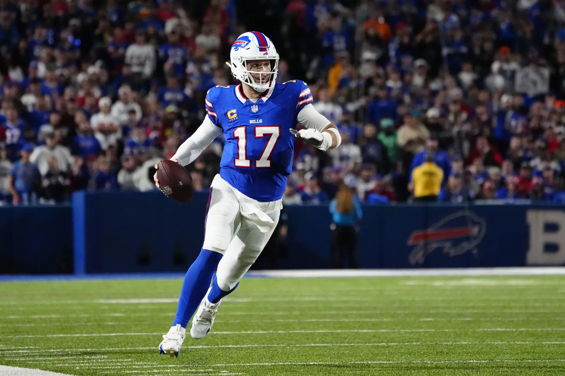 Sep 23, 2024; Orchard Park, New York, USA; Buffalo Bills quarterback Josh Allen (17) runs against the Jacksonville Jaguars during the second half at Highmark Stadium. Mandatory Credit: Gregory Fisher-Imagn Images