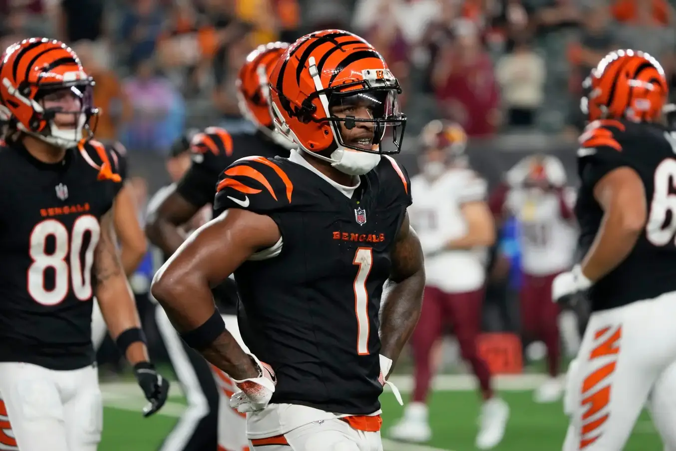 Cincinnati Bengals wide receiver Ja'Marr Chase (1) walks toward the sideline as the Bengals lose to the Washington Commanders during Monday Night Football September 23, 2024 at Paycor Stadium. © Cara Owsley/The Enquirer / USA TODAY NETWORK via Imagn Images