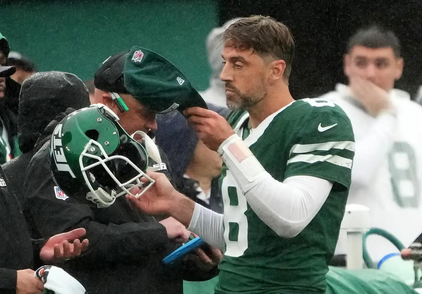 Sep 29, 2024; East Rutherford, New Jersey, USA; New York Jets quarterback Aaron Rodgers (8) on the sidelines after theh Jets failed to score on the Denver Broncos late in the fourth quarter at MetLife Stadium. Mandatory Credit: Robert Deutsch-Imagn Images