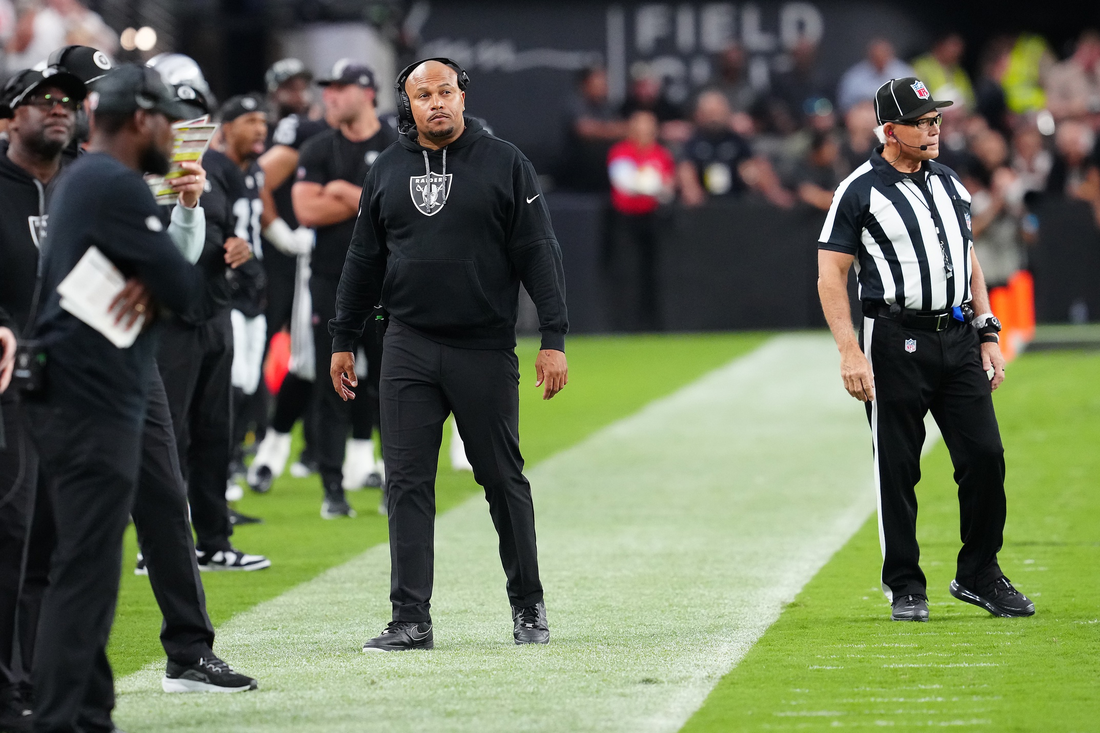 Sep 29, 2024; Paradise, Nevada, USA; Las Vegas Raiders head coach Antonio Pierce watches play against the Cleveland Browns during the second quarter at Allegiant Stadium. Mandatory Credit: Stephen R. Sylvanie-Imagn Images