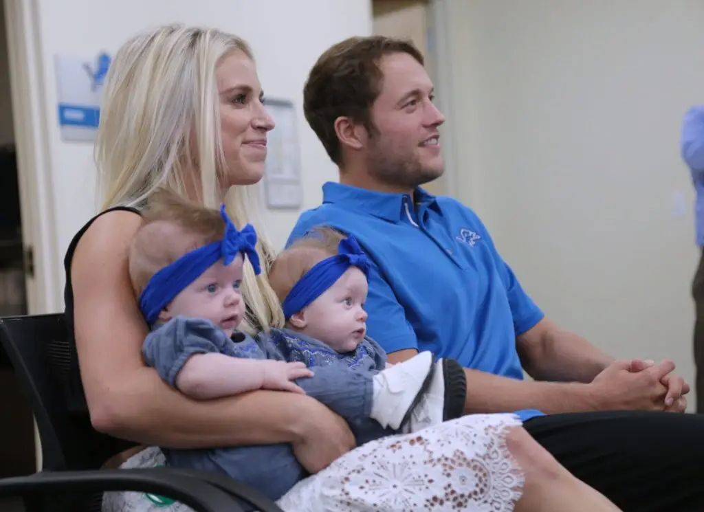 Detroit Lions quarterback Matthew Stafford with his wife Kelly Stafford, and their twin daughters Sawyer and Chandler Stafford, during a news conference announcing Matthew's $135 million, five-year contract extension at the Lions' training facility in Allen Park on Aug. 29, 2017. Img 082917 Staffordcontr 1