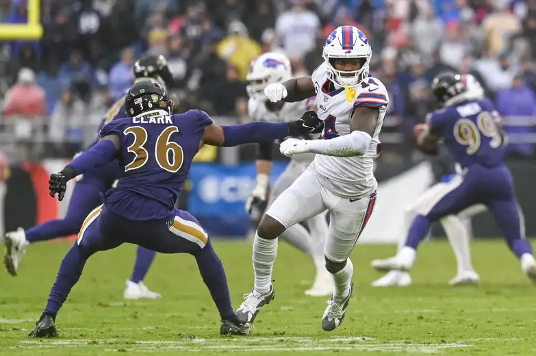 Oct 2, 2022; Baltimore, Maryland, USA; Buffalo Bills wide receiver Stefon Diggs (14) runs a route as Baltimore Ravens safety Chuck Clark (36) grabs his jersey during the second half at M&T Bank Stadium. Mandatory Credit: Tommy Gilligan-Imagn Images