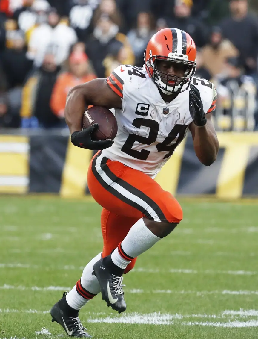 Jan 8, 2023; Pittsburgh, Pennsylvania, USA; Cleveland Browns running back Nick Chubb (24) runs the ball against the Pittsburgh Steelers during the fourth quarter at Acrisure Stadium. Pittsburgh won 28-14. Mandatory Credit: Charles LeClaire-Imagn Images