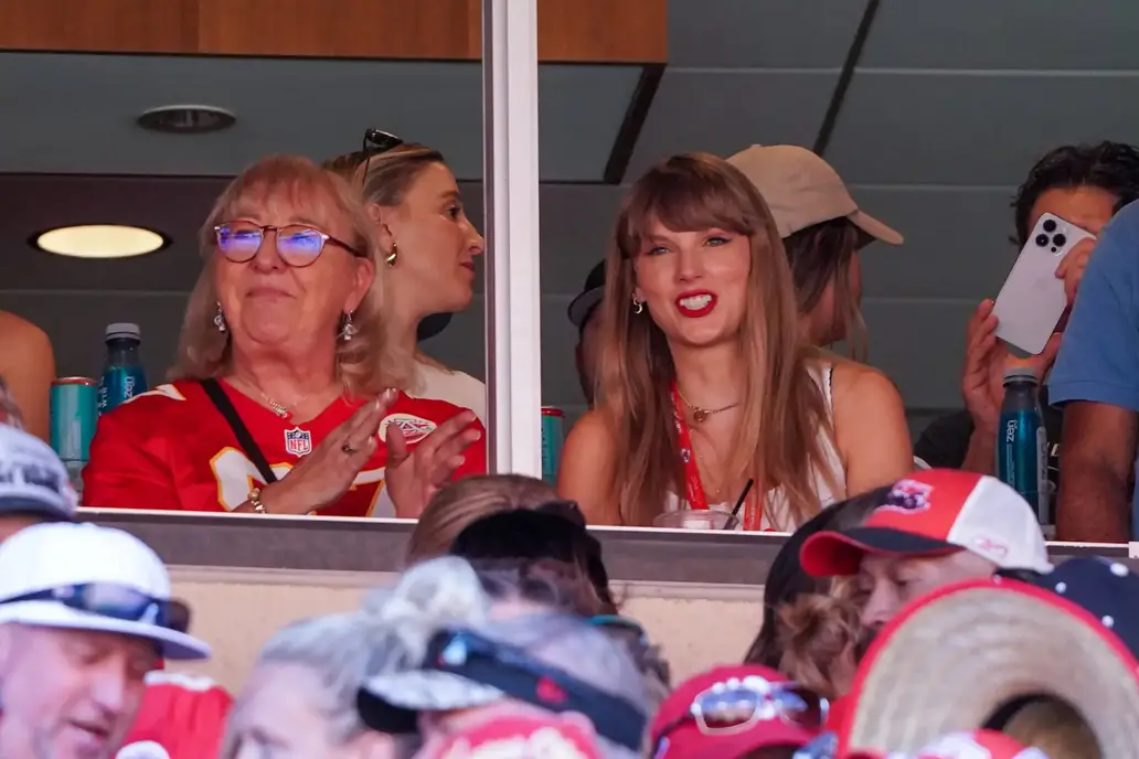 Sep 24, 2023; Kansas City, Missouri, USA; Taylor Swift reacts while sitting next to Donna Kelce watching the Kansas City Chiefs vs Chicago Bears game during the first half at GEHA Field at Arrowhead Stadium. Mandatory Credit: Denny Medley-Imagn Images