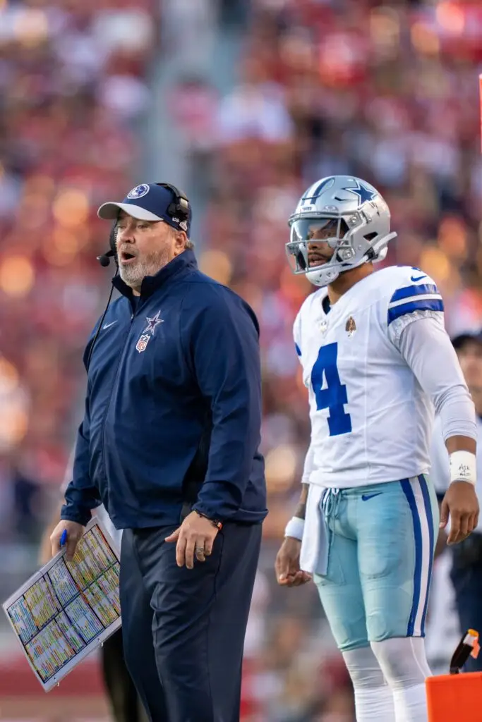 October 8, 2023; Santa Clara, California, USA; Dallas Cowboys head coach Mike McCarthy (left) and quarterback Dak Prescott (4) watch against the San Francisco 49ers during the first quarter at Levi's Stadium. Mandatory Credit: Kyle Terada-Imagn Images