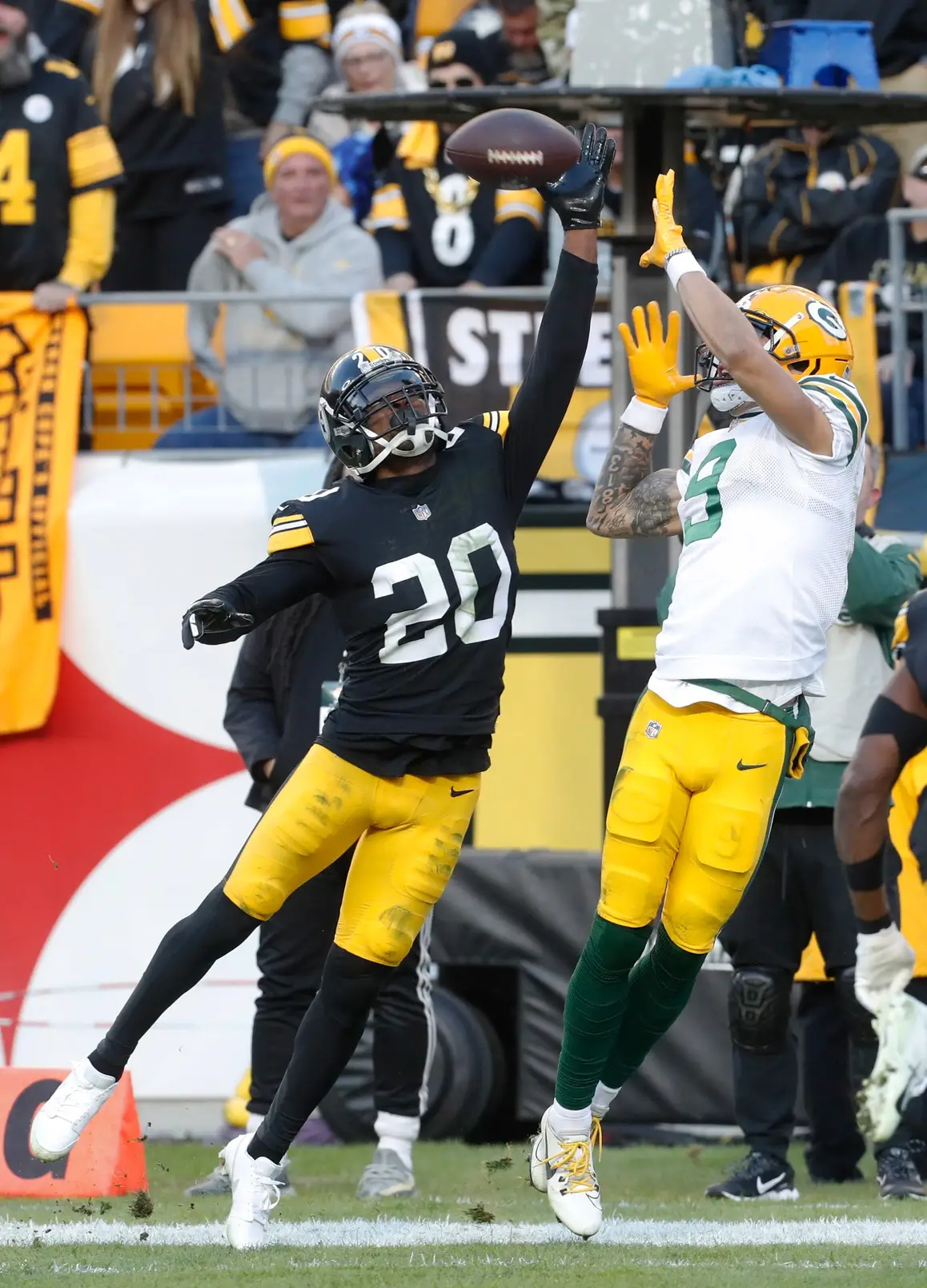 Nov 12, 2023; Pittsburgh, Pennsylvania, USA; Pittsburgh Steelers cornerback Patrick Peterson (20) defends a pass intended for Green Bay Packers wide receiver Christian Watson (9) in the end-zone during the fourth quarter at Acrisure Stadium. Mandatory Credit: Charles LeClaire-Imagn Images (Vikings)