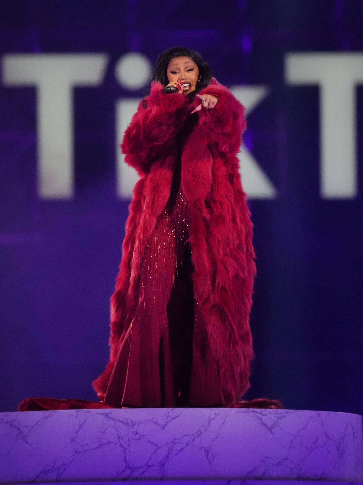 Dec 10, 2023; Mesa, Arizona, United States; Cardi B performs at the TikTok in the Mix music festival at Sloan Park. © Joseph Rondone / USA TODAY NETWORK (Stefon Diggs Texans)