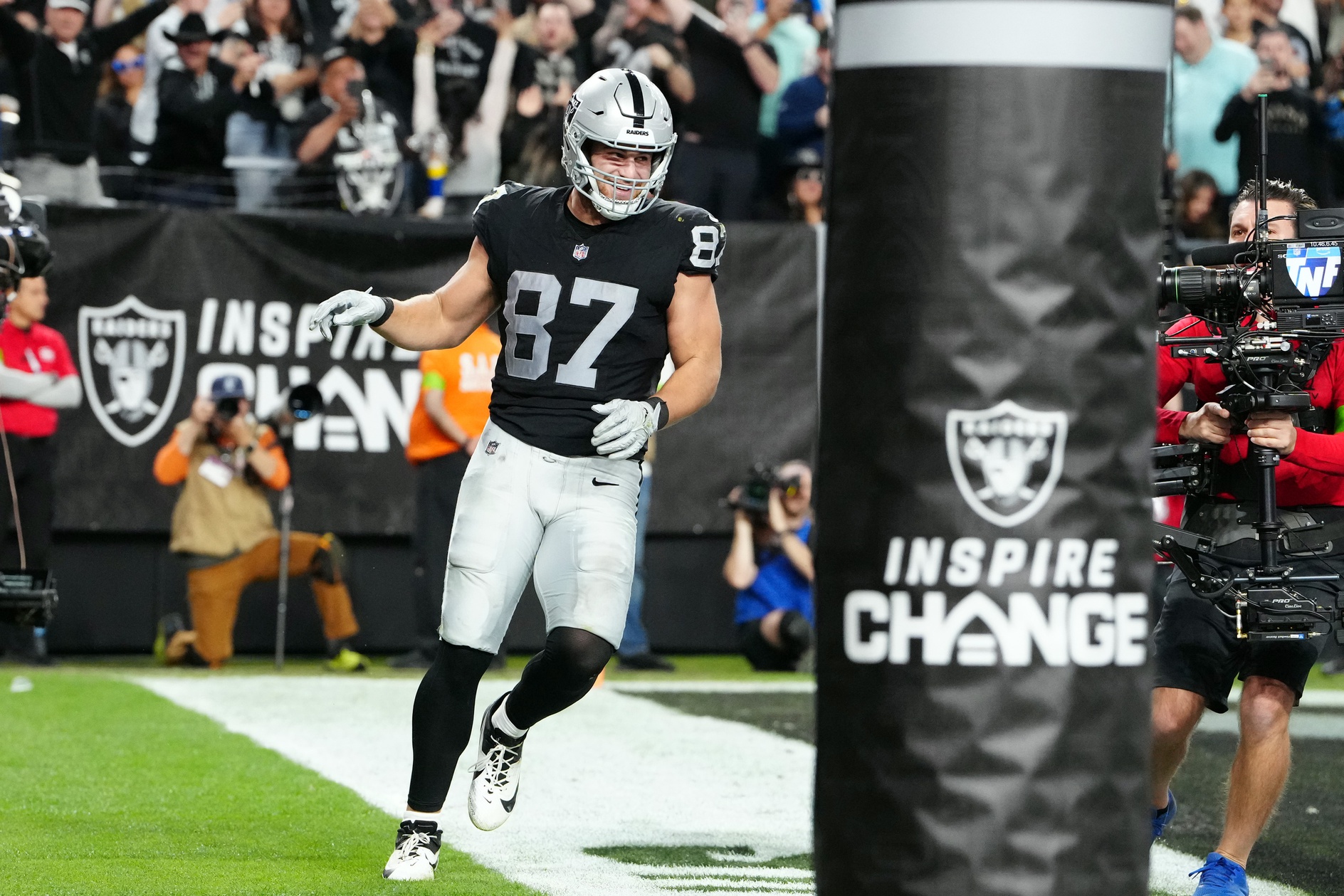 Dec 14, 2023; Paradise, Nevada, USA; Las Vegas Raiders tight end Michael Mayer (87) celebrates after scoring a touchdown in the second quarter against the Los Angeles Chargers at Allegiant Stadium. Mandatory Credit: Stephen R. Sylvanie-Imagn Images