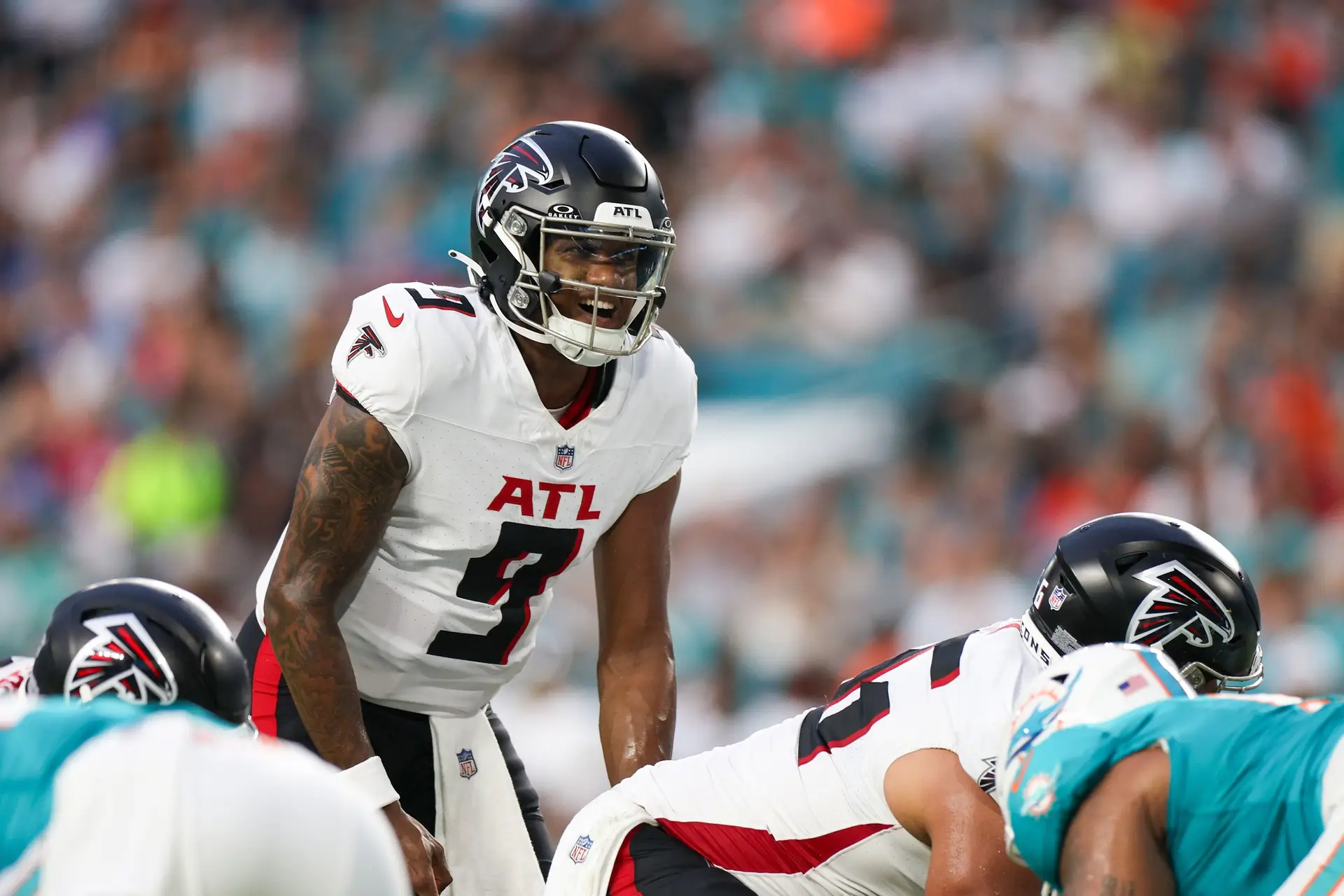 Aug 9, 2024; Miami Gardens, Florida, USA; Atlanta Falcons quarterback Michael Penix Jr. (9) calls a play at the line against the Miami Dolphins in the first quarter during preseason at Hard Rock Stadium. Mandatory Credit: Nathan Ray Seebeck-Imagn Images (Las Vegas Raiders)