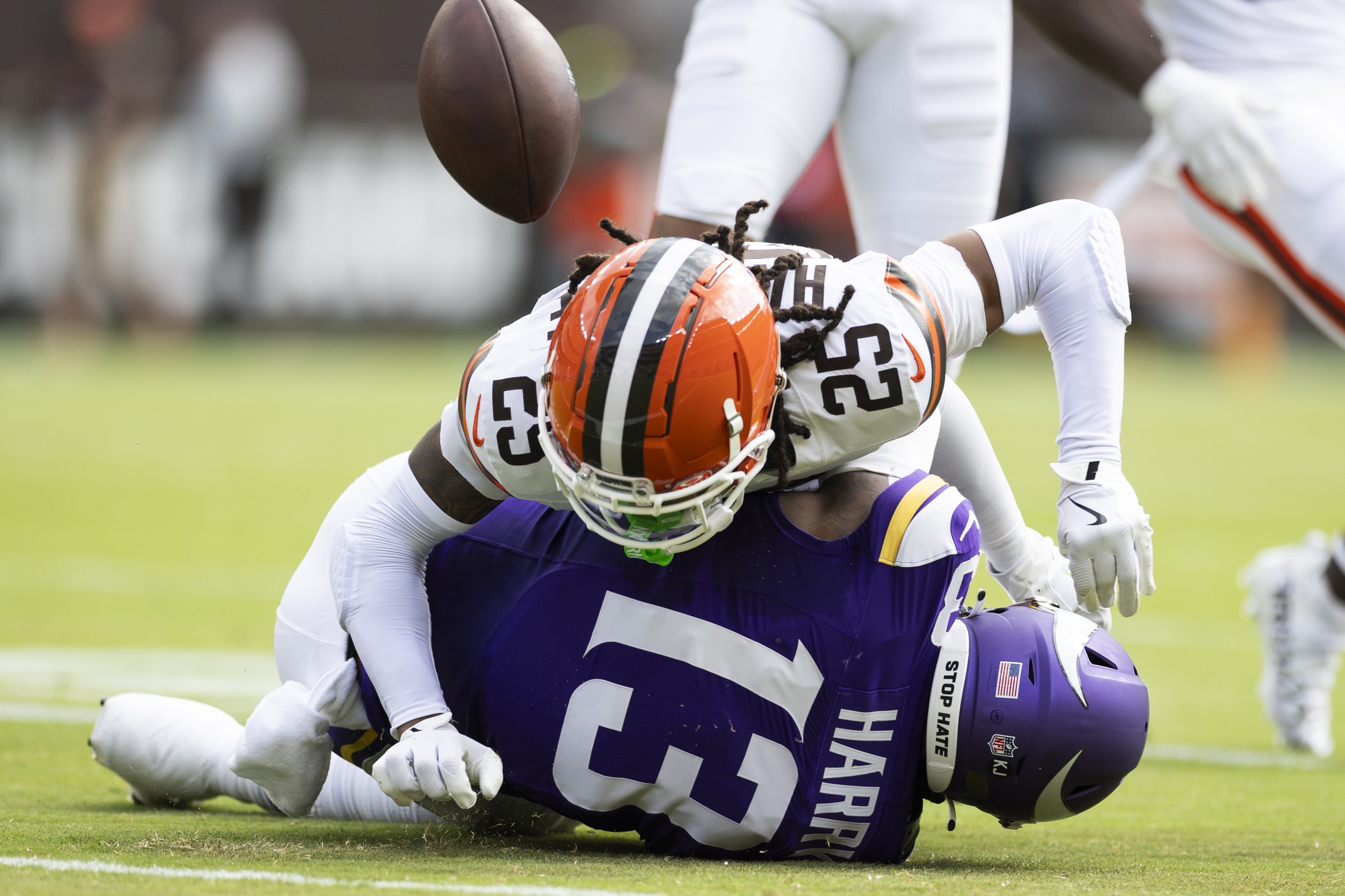 Aug 17, 2024; Cleveland, Ohio, USA; Cleveland Browns cornerback Kahlef Hailassie (25) tackles Minnesota Vikings wide receiver N'Keal Harry (13) breaking up the pass during the first quarter at Cleveland Browns Stadium. Mandatory Credit: Scott Galvin-Imagn Images