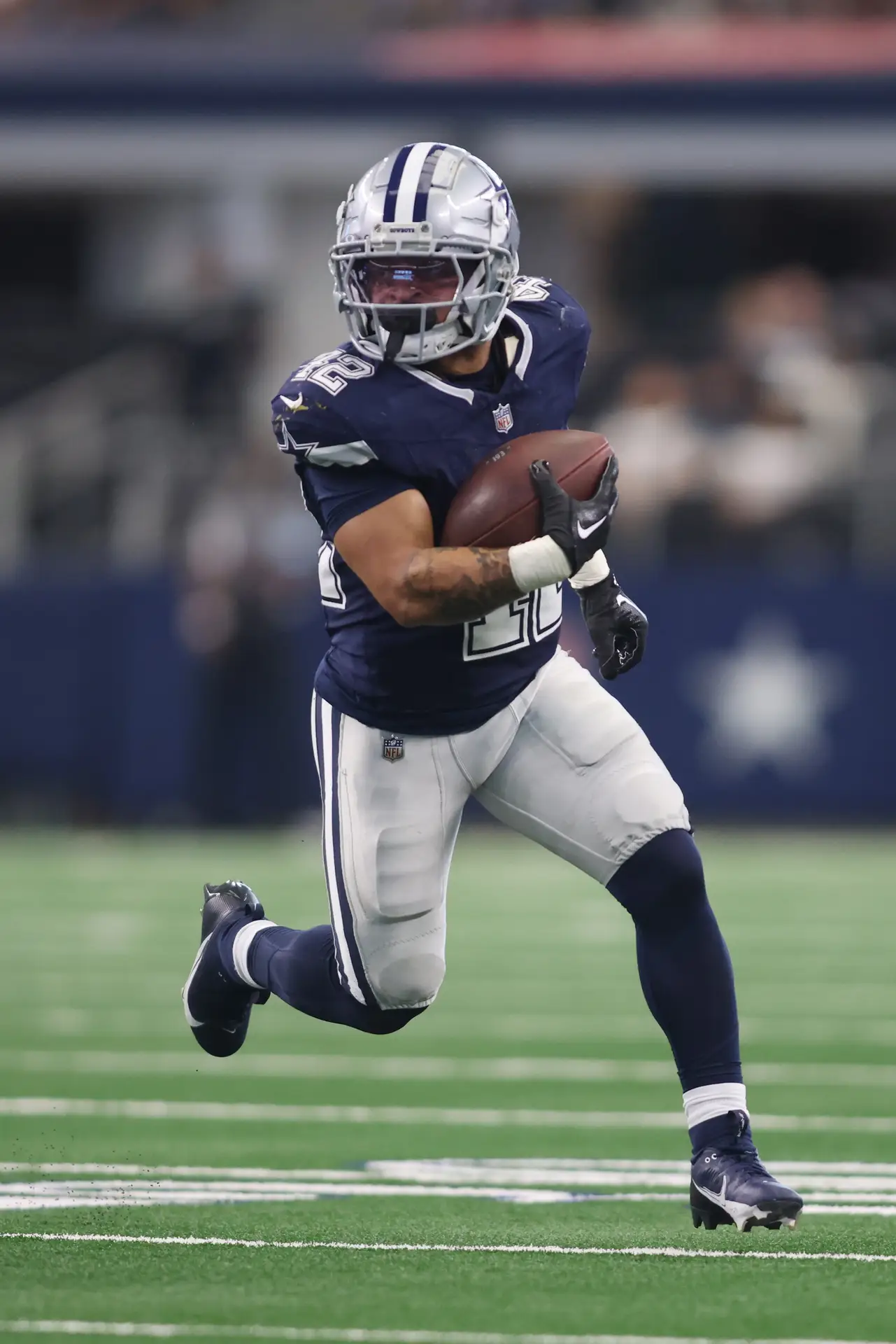 Aug 24, 2024; Arlington, Texas, USA; Dallas Cowboys running back Deuce Vaughn (42) runs the ball in the first half against the Los Angeles Chargers at AT&T Stadium. Mandatory Credit: Tim Heitman-Imagn Images