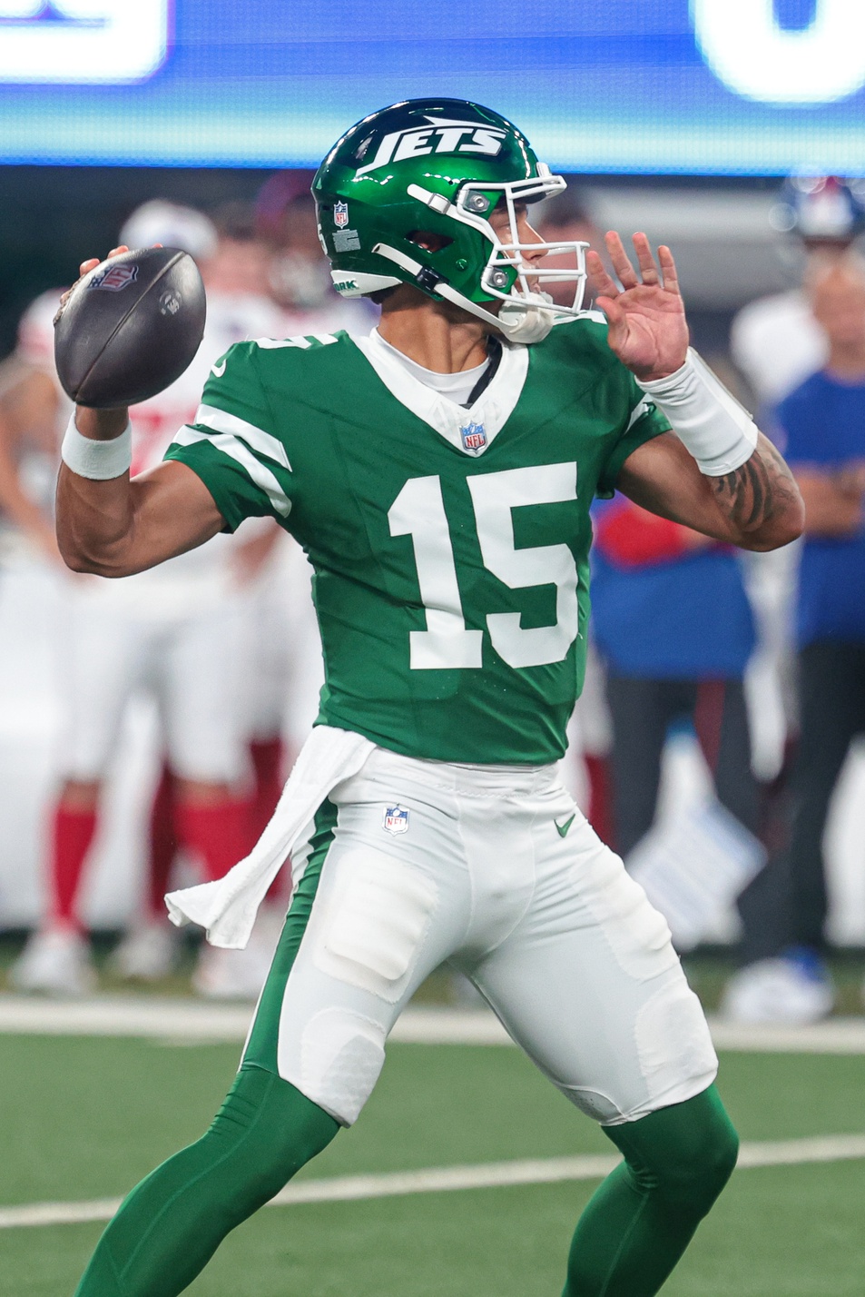 Aug 24, 2024; East Rutherford, New Jersey, USA; New York Jets quarterback Adrian Martinez (15) throws the ball during the first quarter against the New York Giants at MetLife Stadium. Mandatory Credit: Vincent Carchietta-Imagn Images