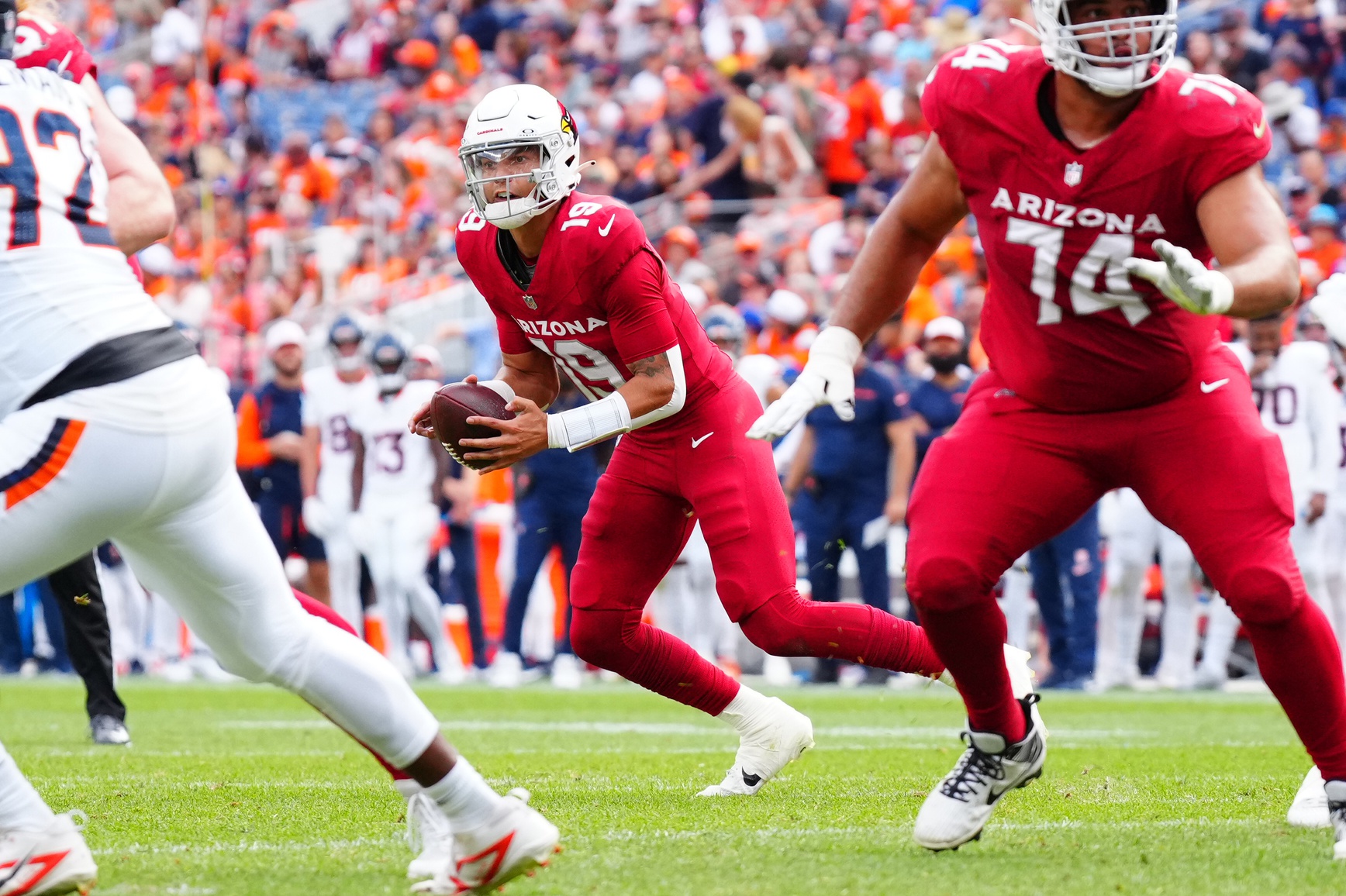 Aug 25, 2024; Denver, Colorado, USA; Arizona Cardinals quarterback Desmond Ridder (19) during the second half against the Denver Broncos at Empower Field at Mile High. Mandatory Credit: Ron Chenoy-Imagn Images (Raiders)