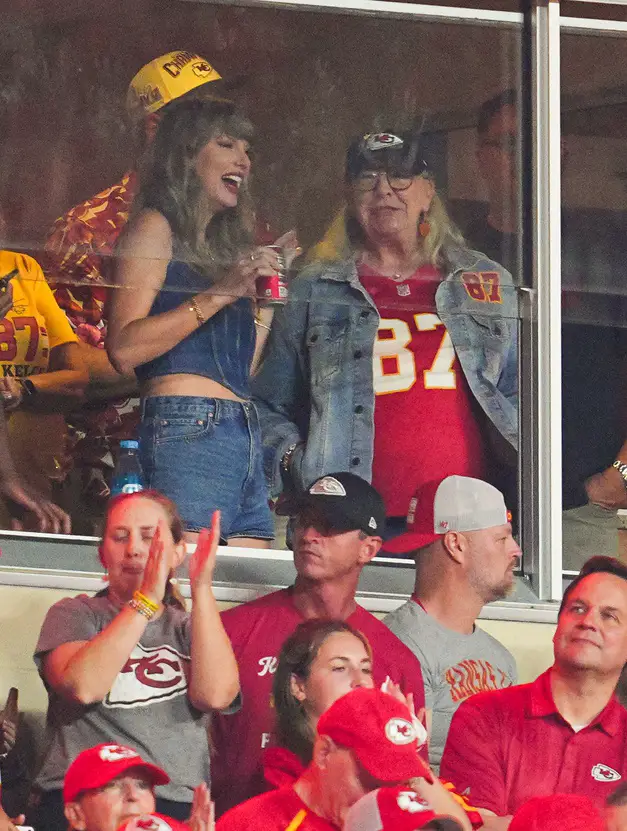 Sep 5, 2024; Kansas City, Missouri, USA; Recording artist Taylor Swift and Donna Kelce watch the action during the second half between the Baltimore Ravens and the Kansas City Chiefs at GEHA Field at Arrowhead Stadium. Mandatory Credit: Jay Biggerstaff-Imagn Images