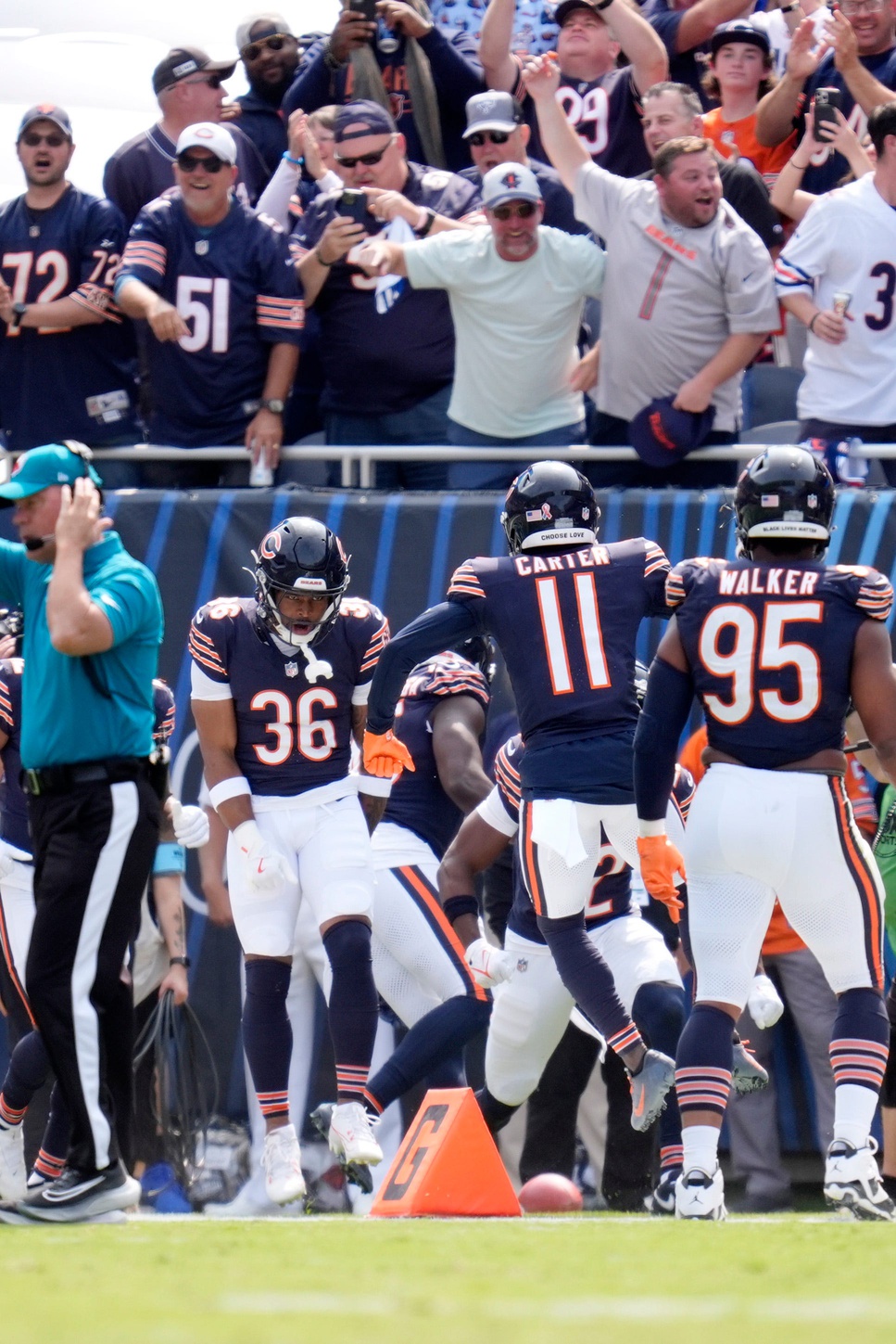 Chicago Bears safety Jonathan Owens (36) celebrates his touchdown against the Tennessee Titans after a blocked punt during the third quarter at Soldier Field in Chicago, Ill., Sunday, Sept. 8, 2024. © Andrew Nelles / The Tennessean / USA TODAY NETWORK