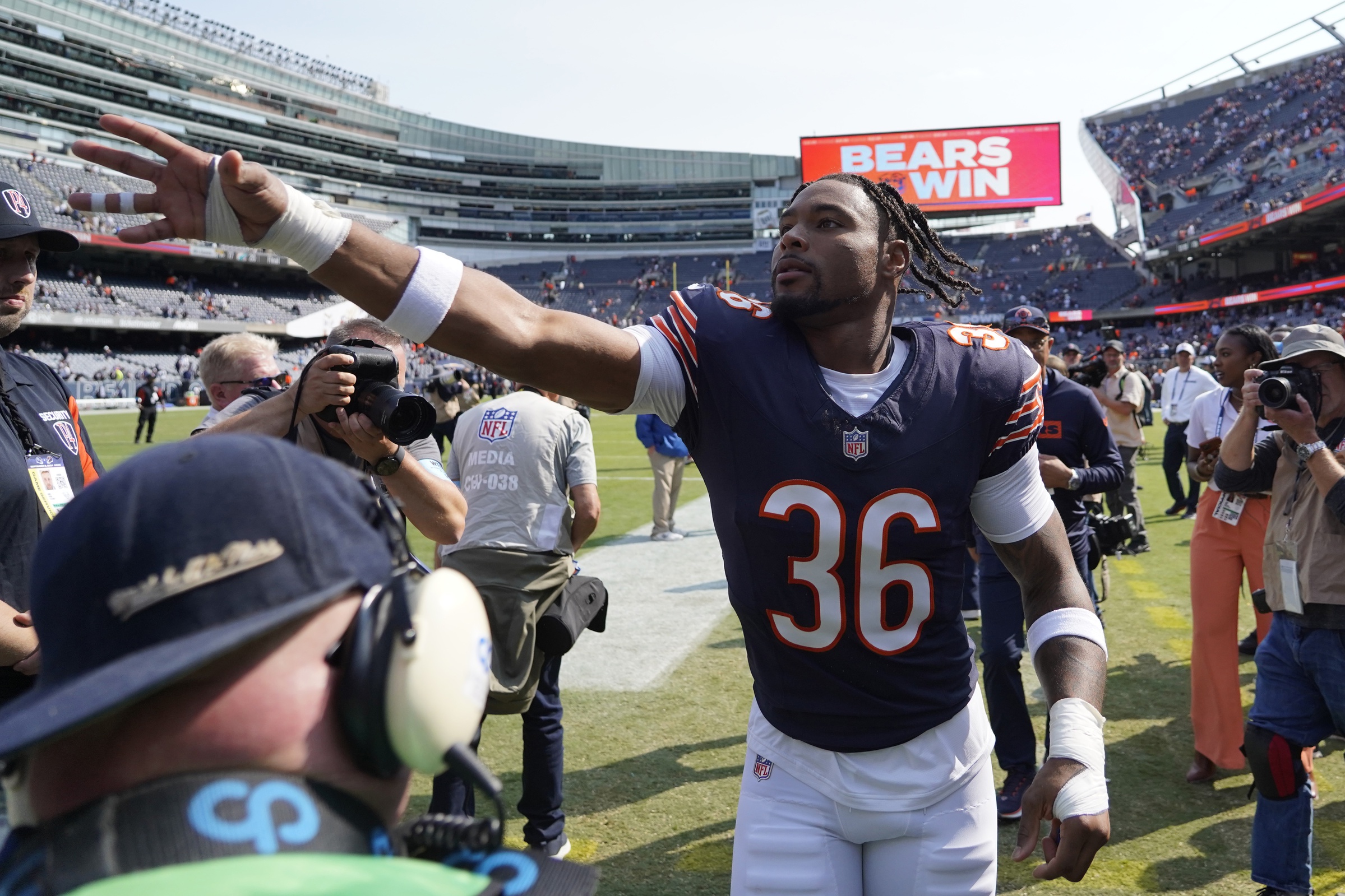 Sep 8, 2024; Chicago, Illinois, USA; Chicago Bears safety Jonathan Owens (36) celebrates after the win against the Tennessee Titans at Soldier Field. Mandatory Credit: David Banks-Imagn Images