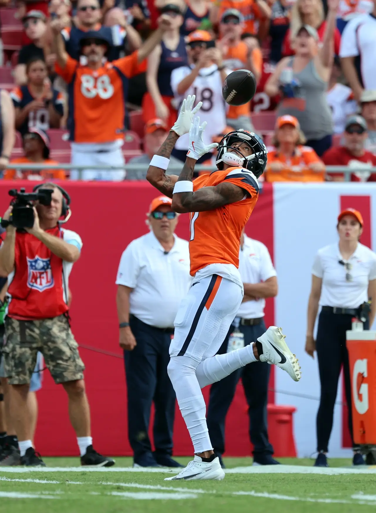 Sep 22, 2024; Tampa, Florida, USA; Denver Broncos wide receiver Josh Reynolds (11) catches the ball against the Tampa Bay Buccaneers during the first quarter at Raymond James Stadium. Mandatory Credit: Kim Klement Neitzel-Imagn Images