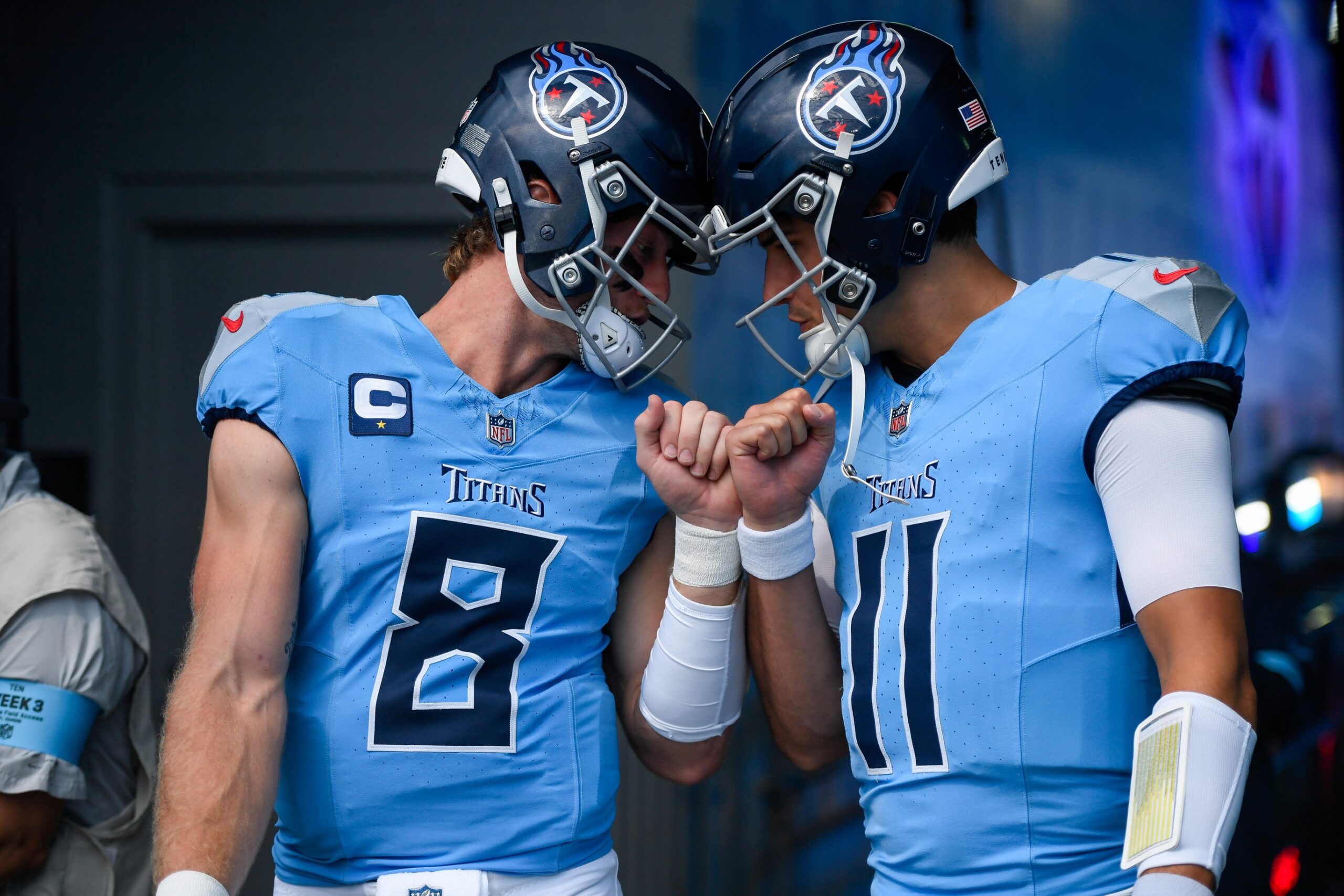 Sep 22, 2024; Nashville, Tennessee, USA; Tennessee Titans Will Levis (8) and quarterback Mason Rudolph (11) take the fieldagainst the Green Bay Packers during pregame warmups at Nissan Stadium. Mandatory Credit: Steve Roberts-Imagn Images