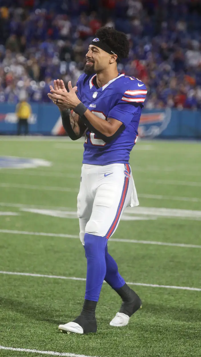 Bills wide receiver Khalil Shakir smiles and claps his hands at his teammates who just scored a touchdown late in the fourth quarter at Highmark Stadium in Orchard Park on Sept. 23, 2024. © Tina MacIntyre-Yee/Democrat and Chronicle / USA TODAY NETWORK via Imagn Images