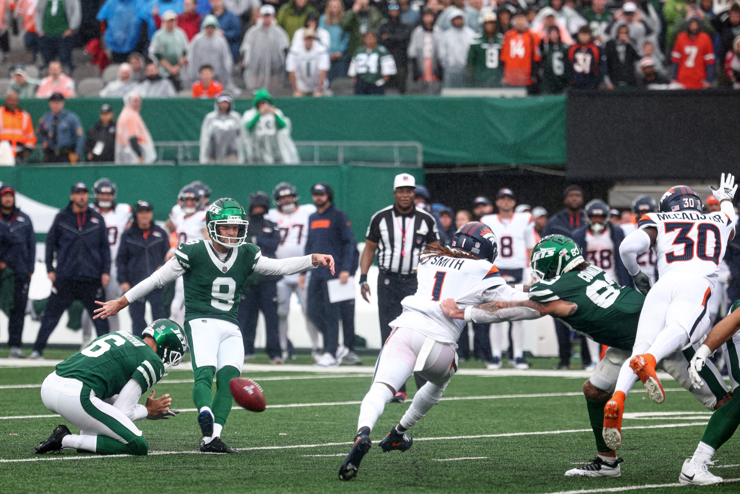 Sep 29, 2024; East Rutherford, New Jersey, USA; New York Jets place kicker Greg Zuerlein (9) missed a fourth quarter field goal against the Denver Broncos at MetLife Stadium. Mandatory Credit: Vincent Carchietta-Imagn Images