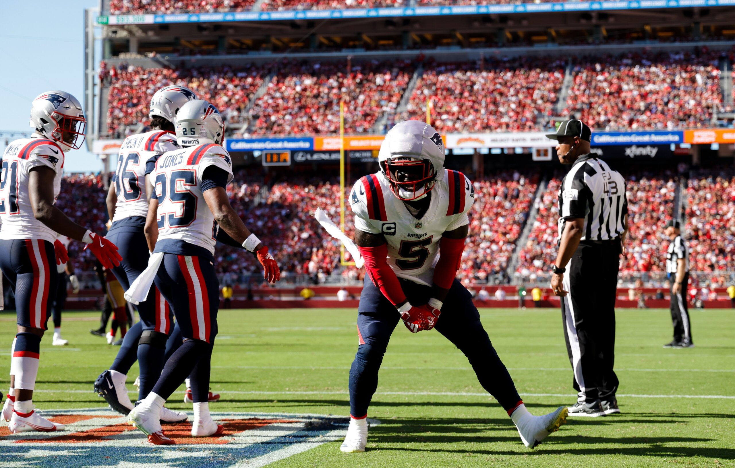 Sep 29, 2024; Santa Clara, California, USA; New England Patriots safety Jabrill Peppers (5) celebrates with teammates after intercepting a pass during the fourth quarter against the San Francisco 49ers at Levi's Stadium. Mandatory Credit: Sergio Estrada-Imagn Images