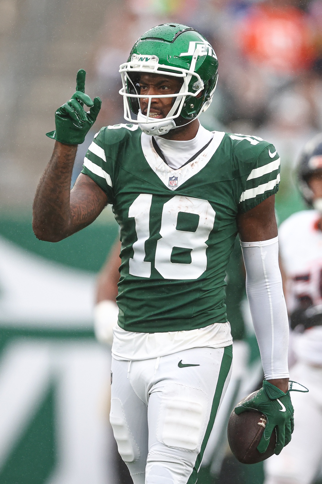 Sep 29, 2024; East Rutherford, New Jersey, USA; New York Jets wide receiver Mike Williams (18) celebrates a first down reception during the second half against the Denver Broncos at MetLife Stadium. Mandatory Credit: Vincent Carchietta-Imagn Images