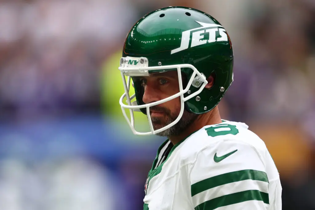 Oct 6, 2024; Tottenham, ENG; New York Jets Quarterback Aaron Rodgers (8) during the warm up before kick off against Minnesota Vikings at Tottenham Hotspur Stadium. Mandatory Credit: Shaun Brooks-Imagn Images