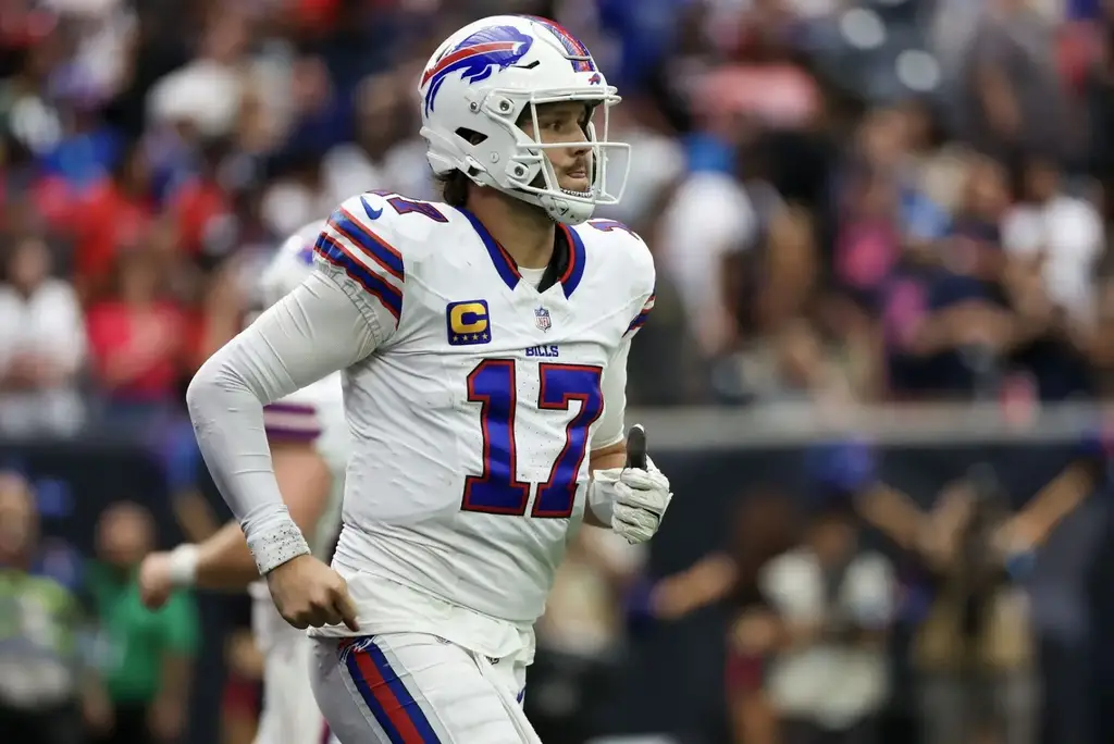 Oct 6, 2024; Houston, Texas, USA; Buffalo Bills quarterback Josh Allen (17) runs off the field before the Bills punt to the Houston Texans in the fourth quarter at NRG Stadium. Mandatory Credit: Thomas Shea-Imagn Images