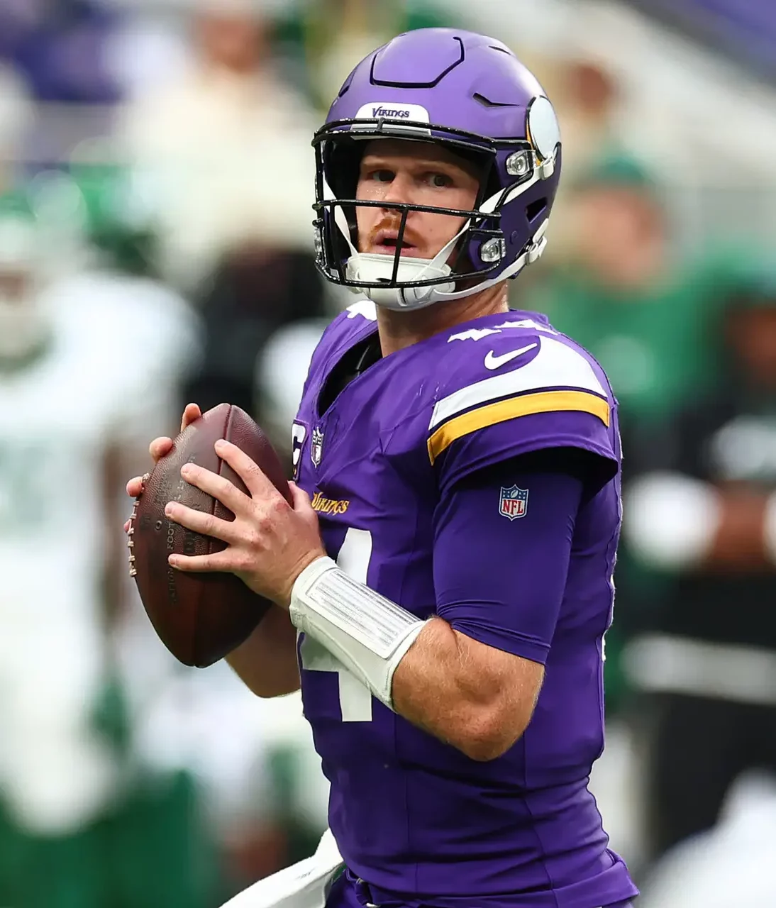 Oct 6, 2024; Tottenham, ENG; Minnesota Vikings Quarterback Sam Darnold (14) looks to throw a pass in the 1st Quarter against New York Jets at Tottenham Hotspur Stadium. Mandatory Credit: Shaun Brooks-Imagn Images