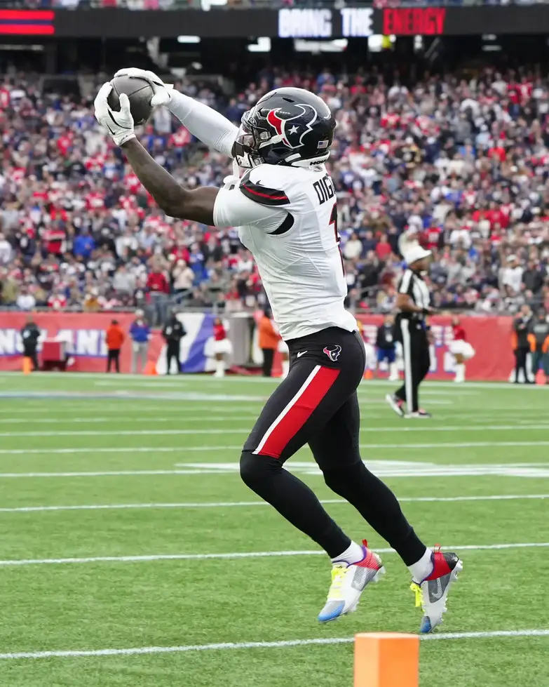 Oct 13, 2024; Foxborough, Massachusetts, USA; Houston Texans wide receiver Stefon Diggs (1) makes a catch against the New England Patriots during the first half at Gillette Stadium. Mandatory Credit: Gregory Fisher-Imagn Images (Ravens)