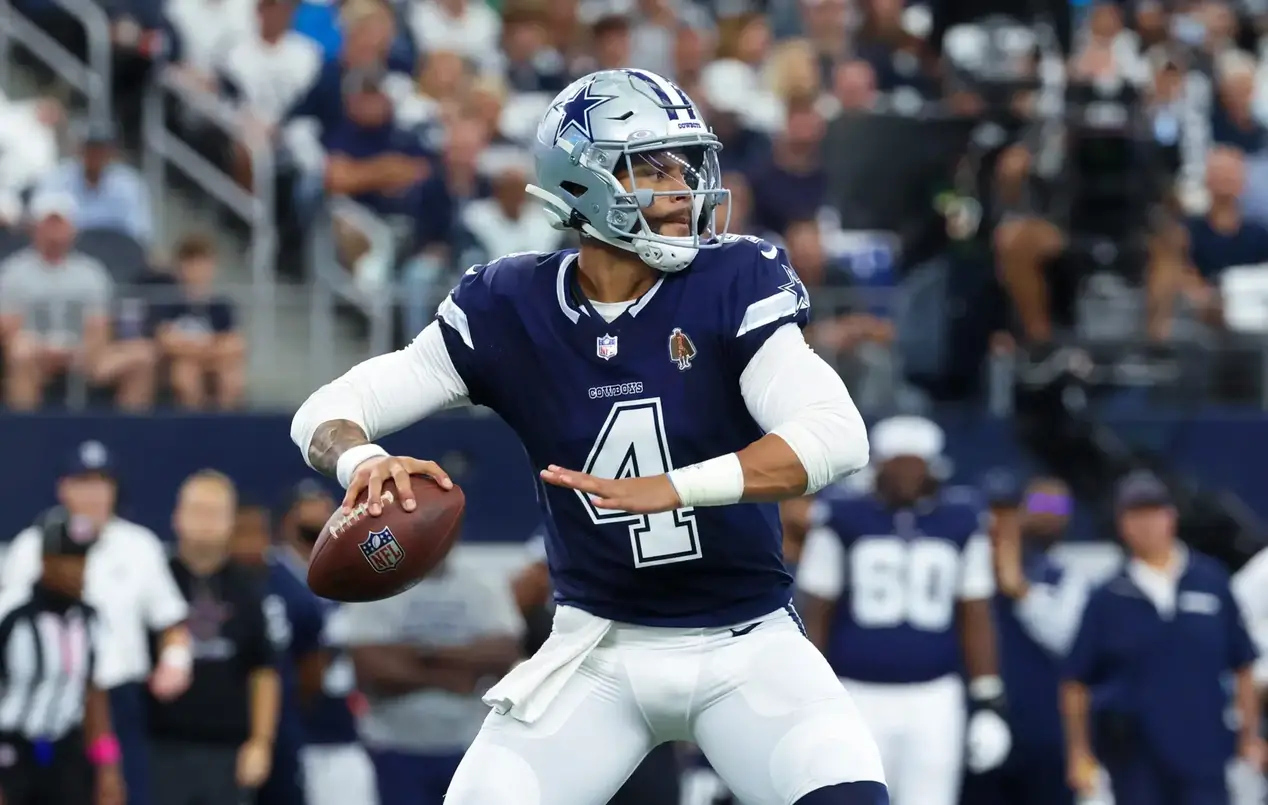 Oct 13, 2024; Arlington, Texas, USA; Dallas Cowboys quarterback Dak Prescott (4) throws during the first quarter against the Detroit Lions at AT&T Stadium. Mandatory Credit: Kevin Jairaj-Imagn Images