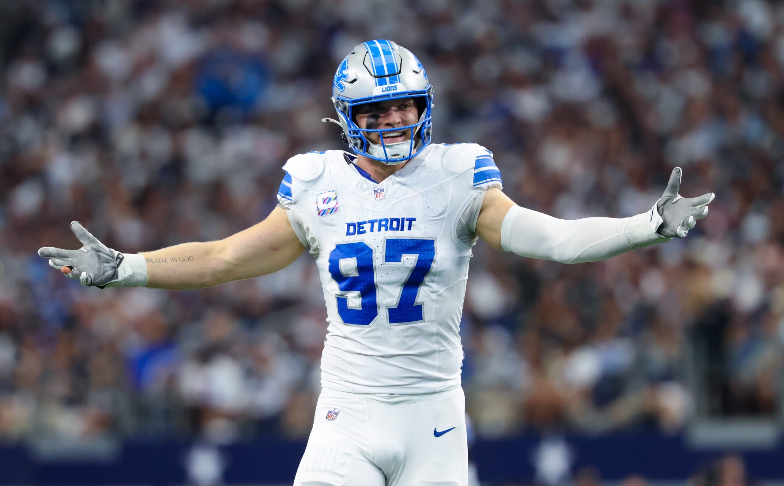 Oct 13, 2024; Arlington, Texas, USA; Detroit Lions defensive end Aidan Hutchinson (97) reacts during the second quarter against the Dallas Cowboys at AT&T Stadium. Mandatory Credit: Kevin Jairaj-Imagn Images