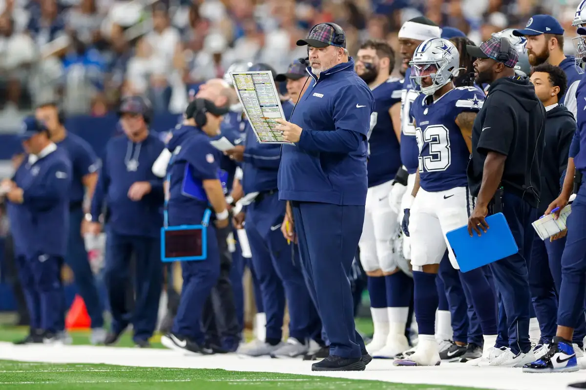 Oct 13, 2024; Arlington, Texas, USA; Dallas Cowboys Head Coach Mike McCarthy looks over the play chart during the first quarter against the Detroit Lions at AT&T Stadium. Mandatory Credit: Andrew Dieb-Imagn Images Oct 13, 2024; Arlington, Texas, USA; Dallas Cowboys Head Coach Mike McCarthy looks over the play chart during the first quarter against the Detroit Lions at AT&T Stadium. Mandatory Credit: Andrew Dieb-Imagn Images