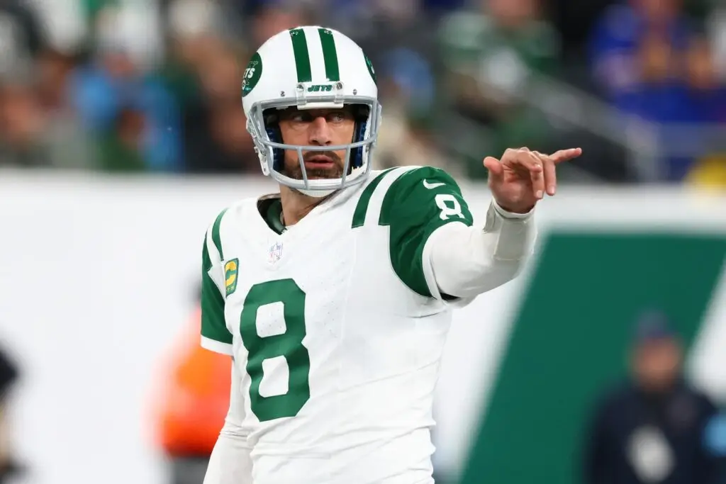 Oct 14, 2024; East Rutherford, New Jersey, USA; New York Jets quarterback Aaron Rodgers (8) during the first half of their game against the Buffalo Bills at MetLife Stadium. Mandatory Credit: Ed Mulholland-Imagn Images