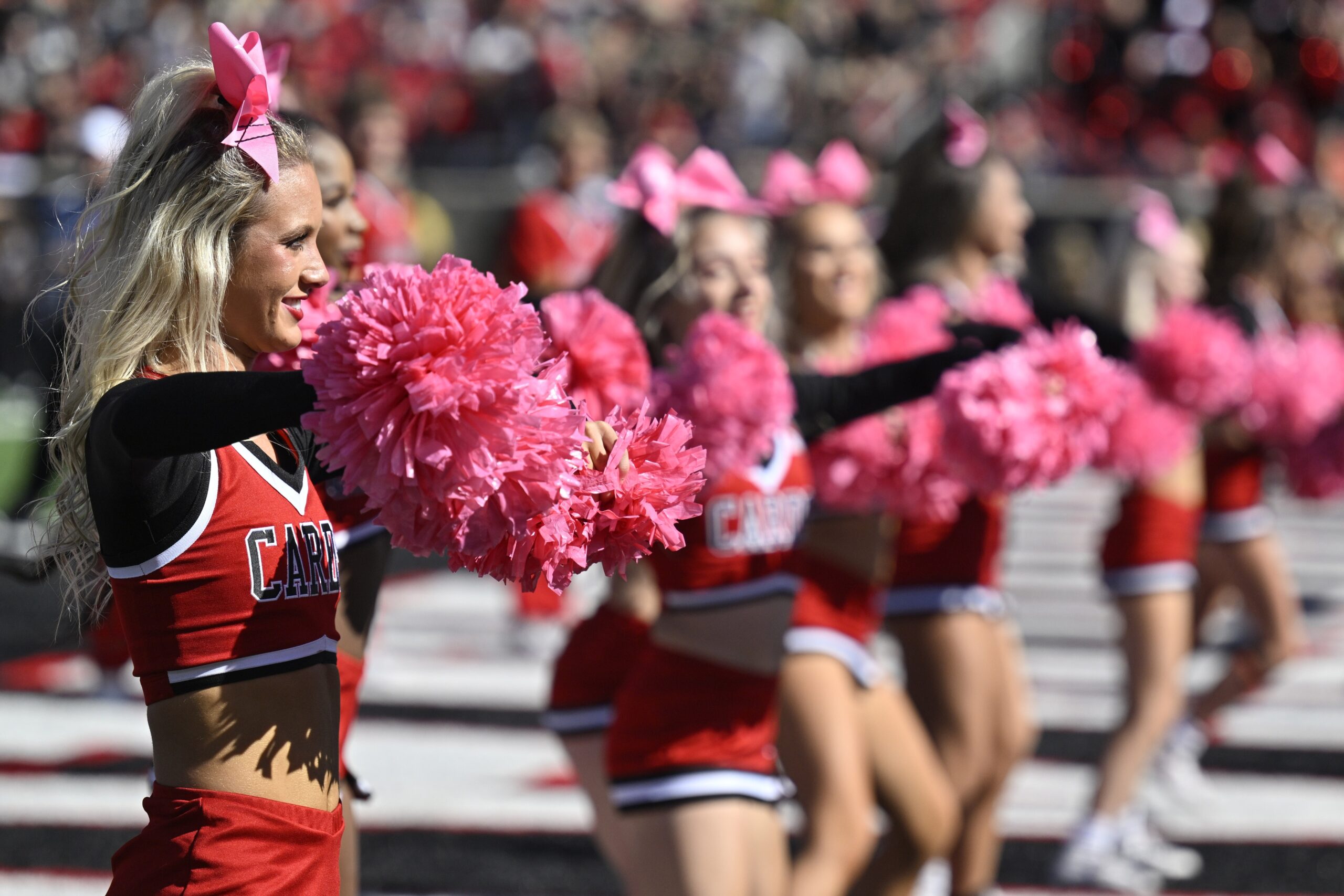 Oct 19, 2024; Louisville, Kentucky, USA; The Louisville Cardinals cheerleaders perform during the second half against the Miami Hurricanes at L&N Federal Credit Union Stadium. Miami defeated Louisville 52-45. Mandatory Credit: Jamie Rhodes-Imagn Images