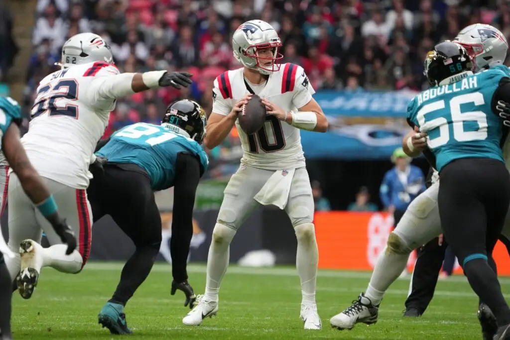 Oct 20, 2024; London, United Kingdom; New England Patriots quarterback Drake Maye (10) throws the ball against the Jacksonville Jaguars in the first half of an NFL International Series game at Wembley Stadium. Mandatory Credit: Kirby Lee-Imagn Images