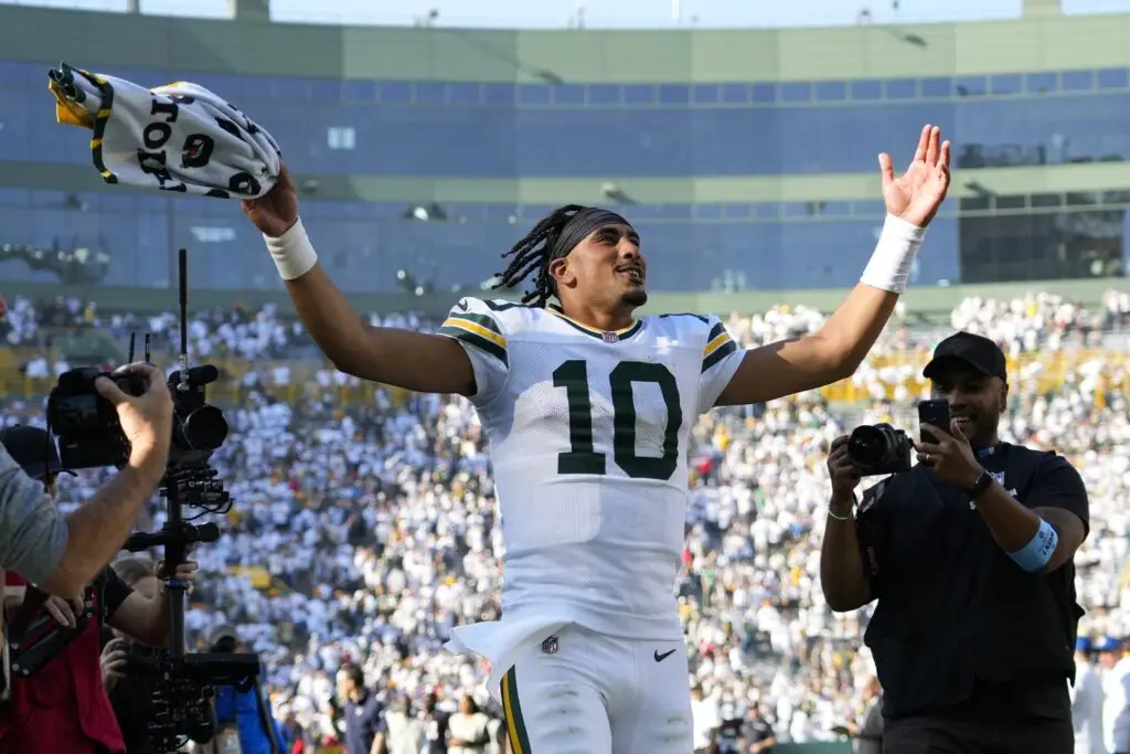 Oct 20, 2024; Green Bay, Wisconsin, USA; Green Bay Packers quarterback Jordan Love (10) celebrates as he runs off the field following the game against the Houston Texans at Lambeau Field. Mandatory Credit: Jeff Hanisch-Imagn Images