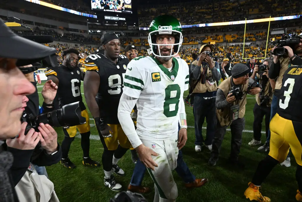 Oct 20, 2024; Pittsburgh, Pennsylvania, USA; New York Jets quarterback Aaron Rodgers (8) reacts following a loss to the Pittsburgh Steelers at Acrisure Stadium. Mandatory Credit: Barry Reeger-Imagn Images