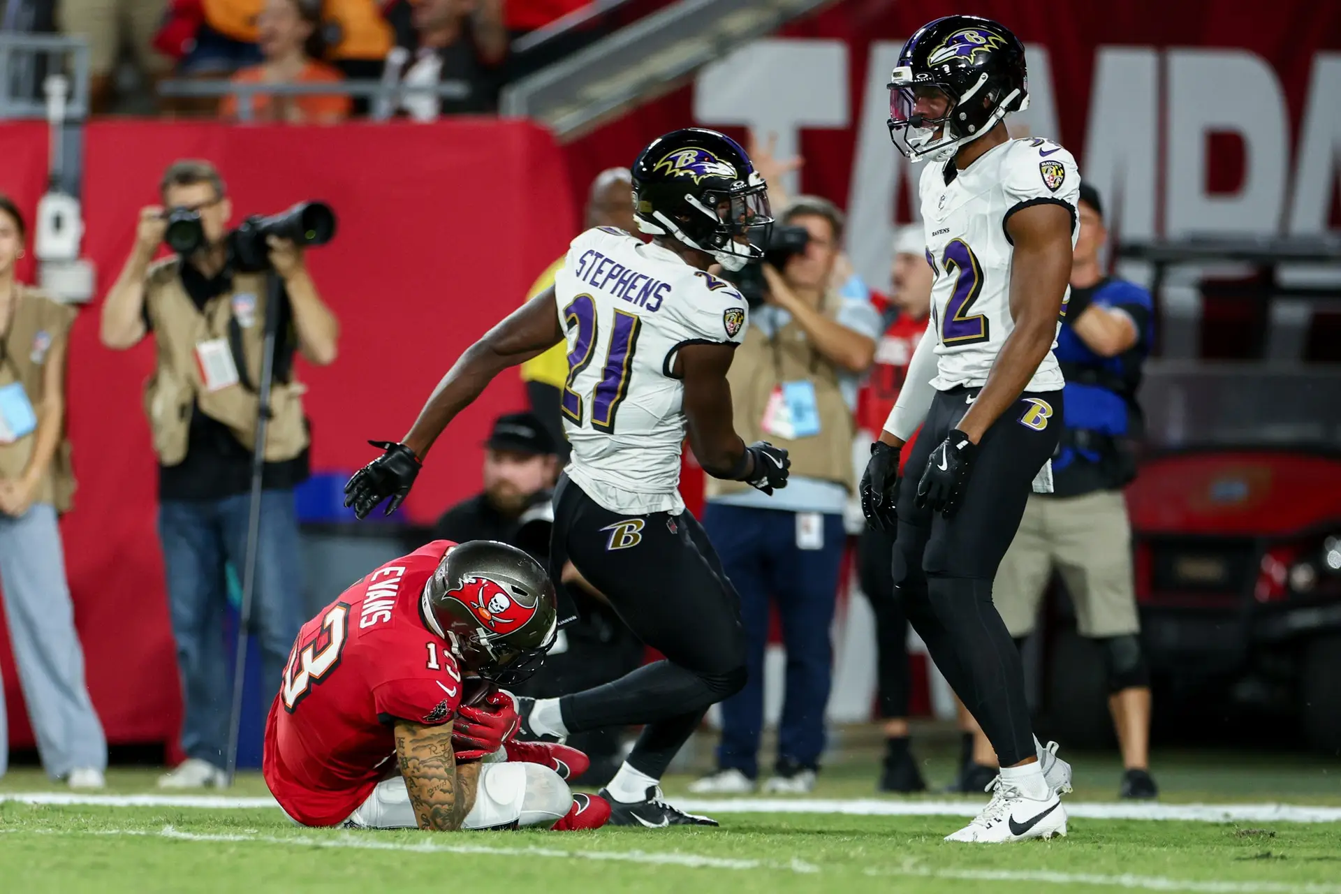 Oct 21, 2024; Tampa, Florida, USA; Tampa Bay Buccaneers wide receiver Mike Evans (13) scores a touchdown against the Baltimore Ravens in the first quarter at Raymond James Stadium. Mandatory Credit: Nathan Ray Seebeck-Imagn Images