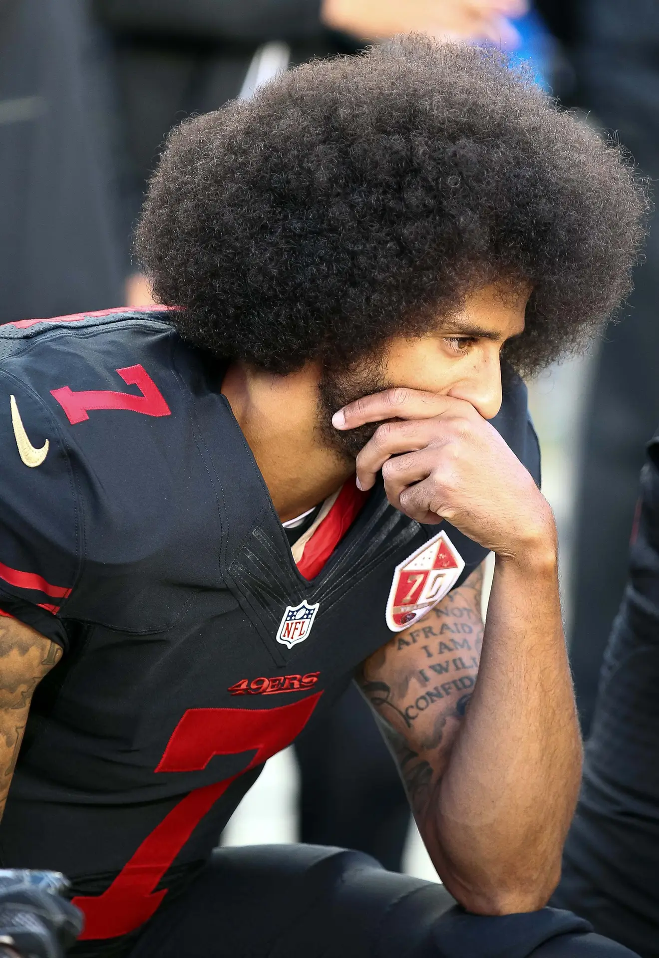 Oct 6, 2016; Santa Clara, CA, USA; San Francisco 49ers quarterback Colin Kaepernick (7) kneels during the national anthem before the game against the Arizona Cardinals at Levi's Stadium. Mandatory Credit: Kelley L Cox-USA TODAY Sports
