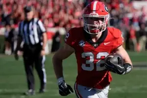 Georgia running back Cash Jones (32) drives in for a touchdown during the first half of a NCAA college football game against Massachusetts in Athens, Ga., on Saturday, Nov. 23, 2024.Joshua L. Jones, Athens Banner-Herald USA TODAY NETWORK