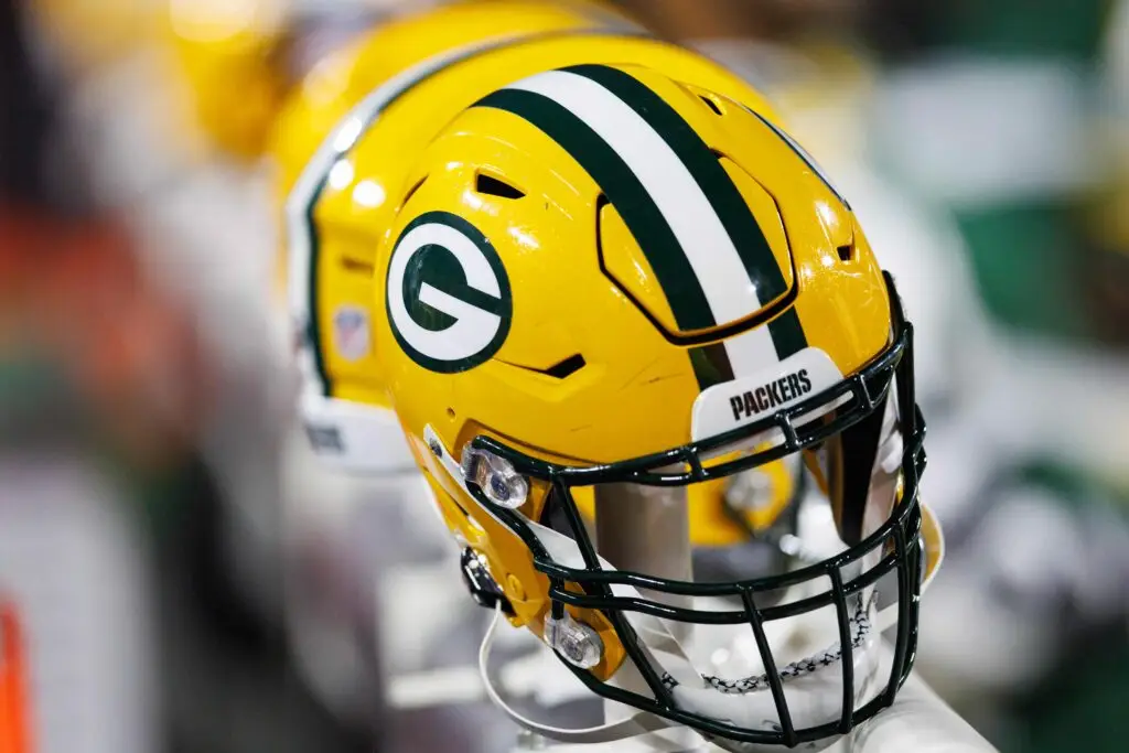 Dec 12, 2021; Green Bay, Wisconsin, USA; Green Bay Packers helmets on the sidelines during the game against the Chicago Bears at Lambeau Field. Mandatory Credit: Jeff Hanisch-USA TODAY Sports