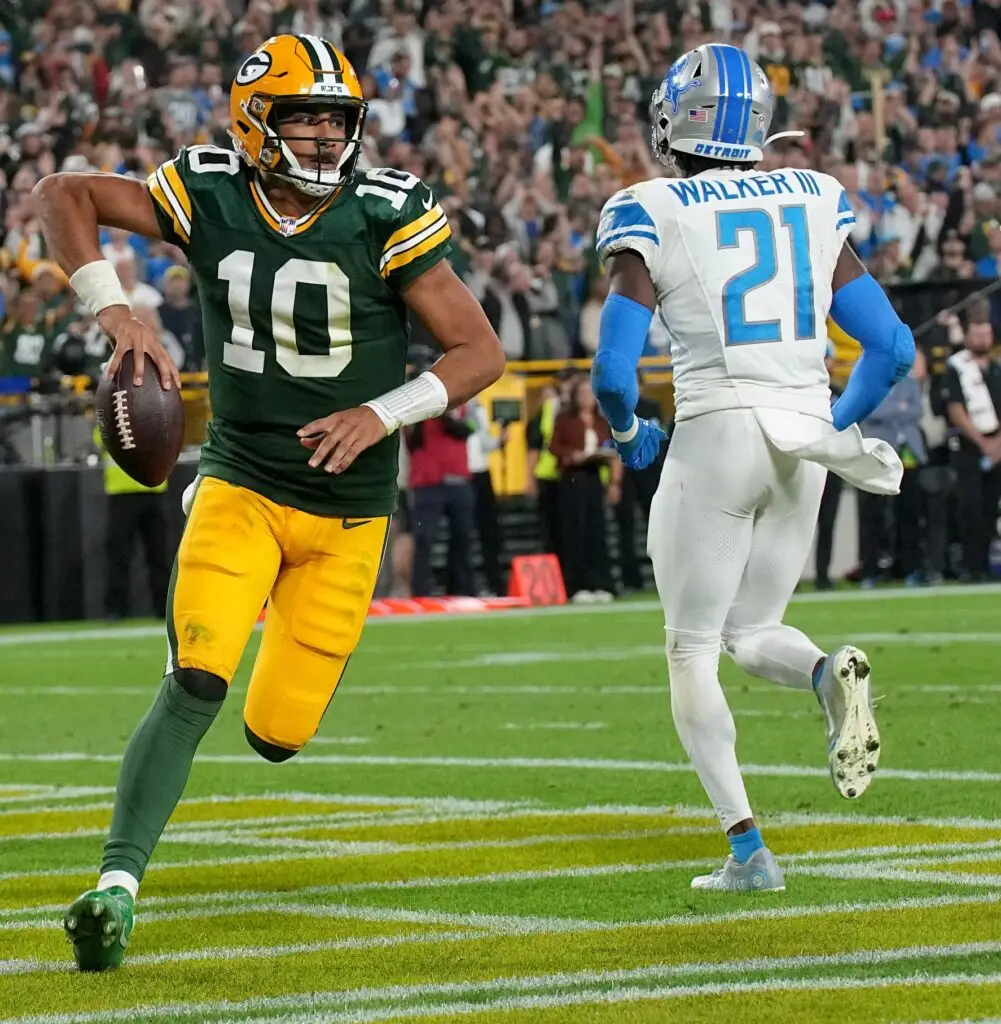 Green Bay Packers quarterback Jordan Love runs nine and for a touchdown during the fourth quarter of their game Thursday, September 28, 2023 at Lambeau Field in Green Bay, Wis. The Detroit Lions beat the Green Bay Packers 34-20. © Mark Hoffman/Milwaukee Journal Sentinel / USA TODAY NETWORK