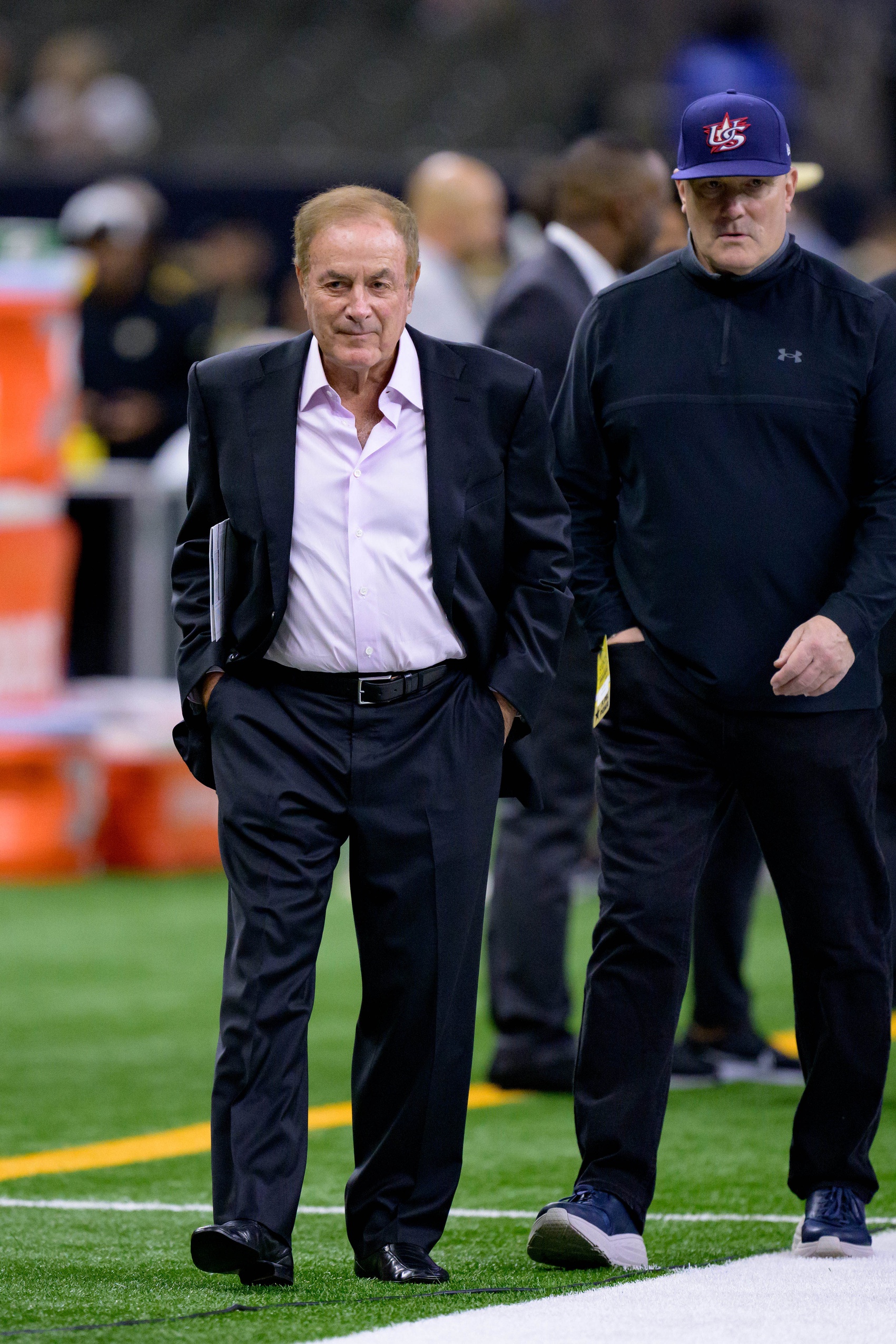 Oct 19, 2023; New Orleans, Louisiana, USA; Sports play-by-play announcer Al Michaels walks the sideline before a game between the New Orleans Saints and the Jacksonville Jaguars at the Caesars Superdome. Mandatory Credit: Matthew Hinton-Imagn Images (NFL)