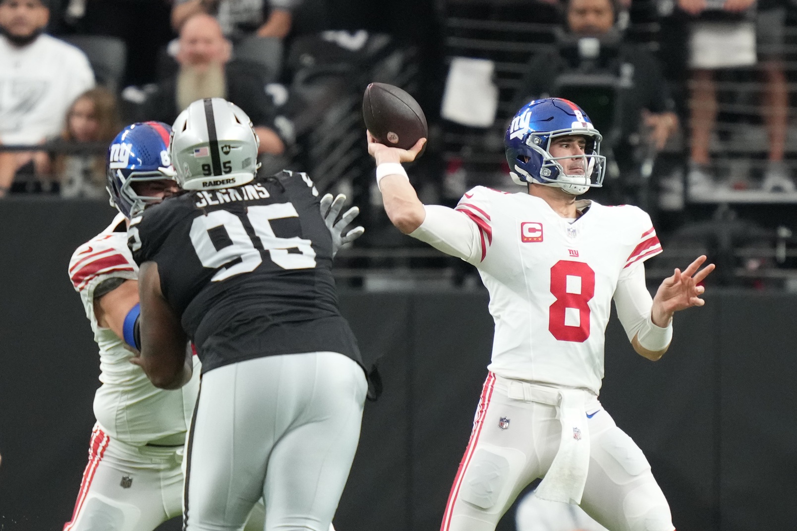 November 5, 2023; Paradise, Nevada, USA; New York Giants quarterback Daniel Jones (8) passes the football against the Las Vegas Raiders during the first quarter at Allegiant Stadium. Mandatory Credit: Kyle Terada-Imagn Images