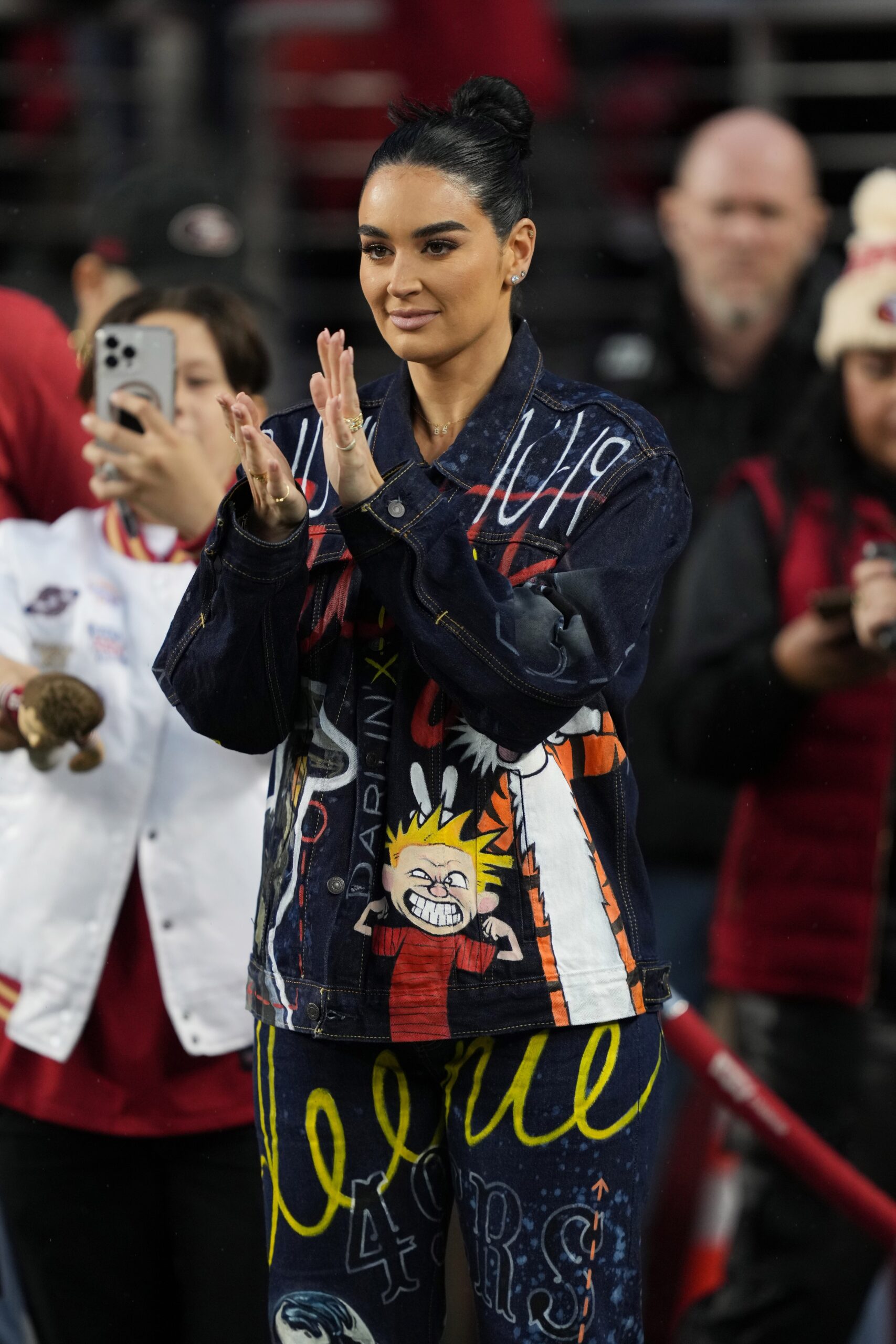 January 20, 2024; Santa Clara, CA, USA; Claire Kittle, wife of San Francisco 49ers tight end George Kittle (85) looks on before a 2024 NFC divisional round game against the Green Bay Packers at Levi's Stadium. Mandatory Credit: Kyle Terada-Imagn Images