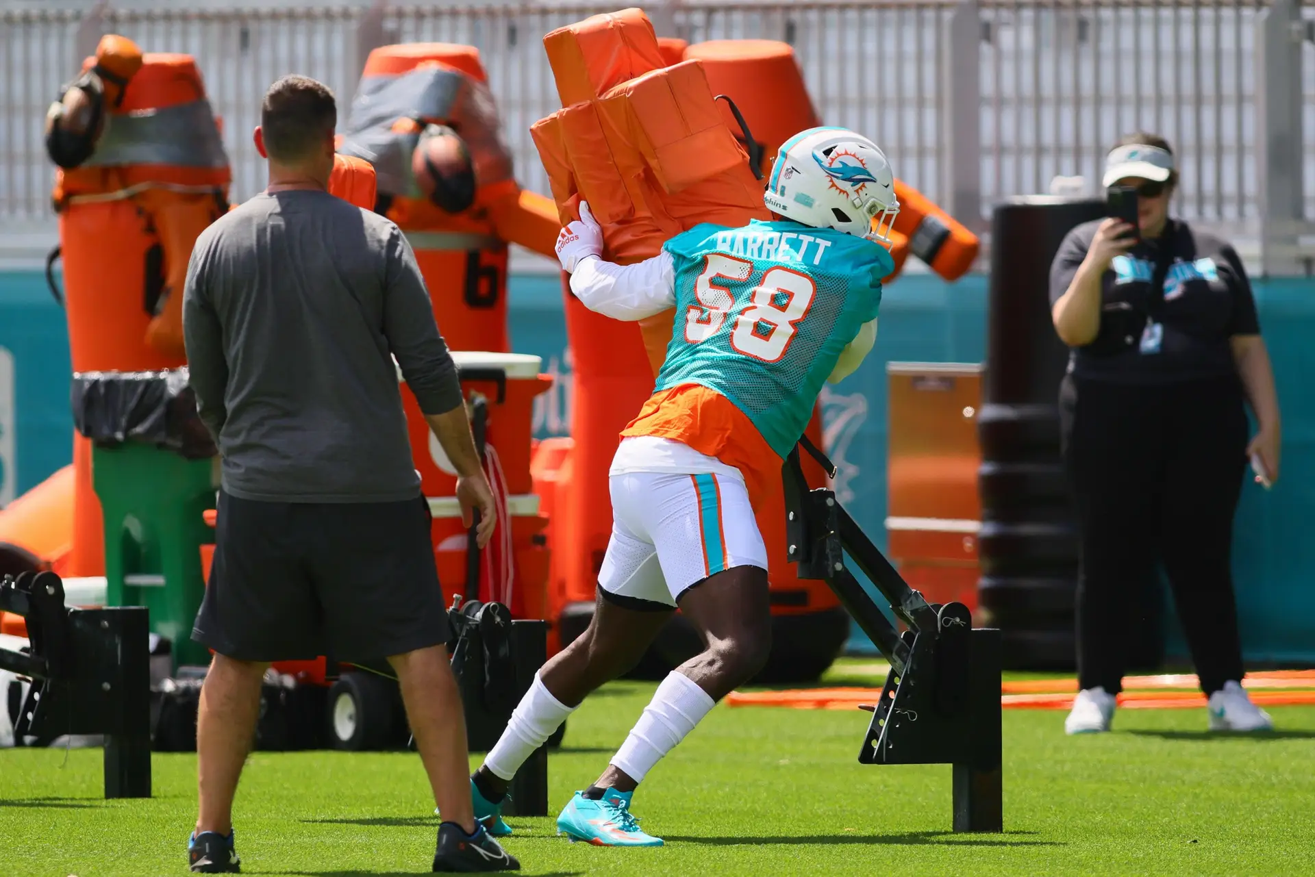 Jun 4, 2024; Miami Gardens, FL, USA; Miami Dolphins linebacker Shaquil Barrett (58) works out during mandatory minicamp at Baptist Health Training Complex. Mandatory Credit: Sam Navarro-Imagn Images